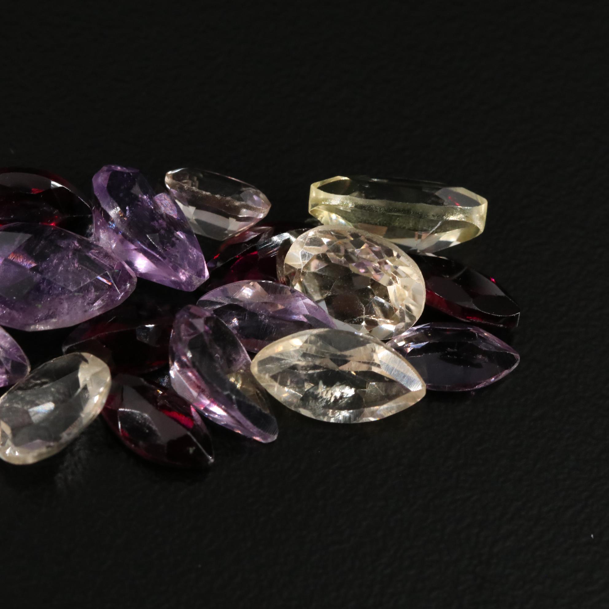 Loose 21.40 CTW Amethyst, Citrine, and Garnet Lot