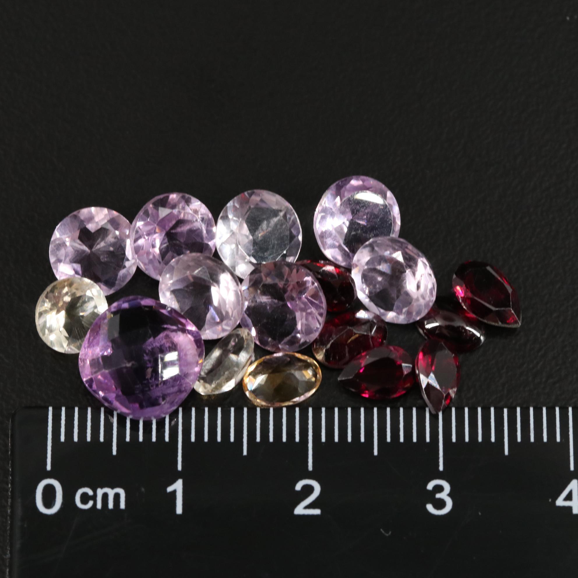 Loose 15.95 CTW Amethyst, Citrine, and Garnet Lot
