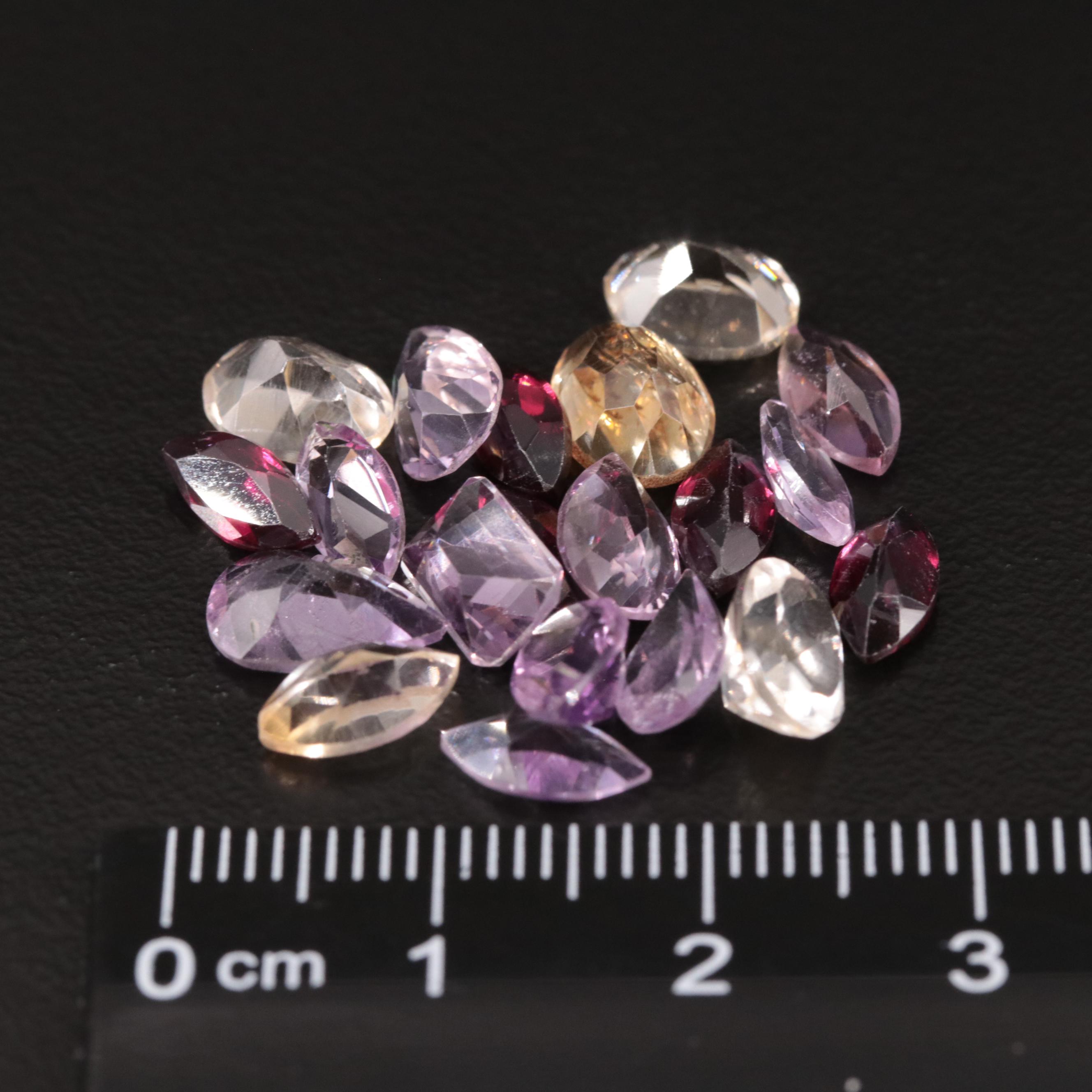 Loose 15.78 CTW Amethyst, Citrine and Garnet Lot