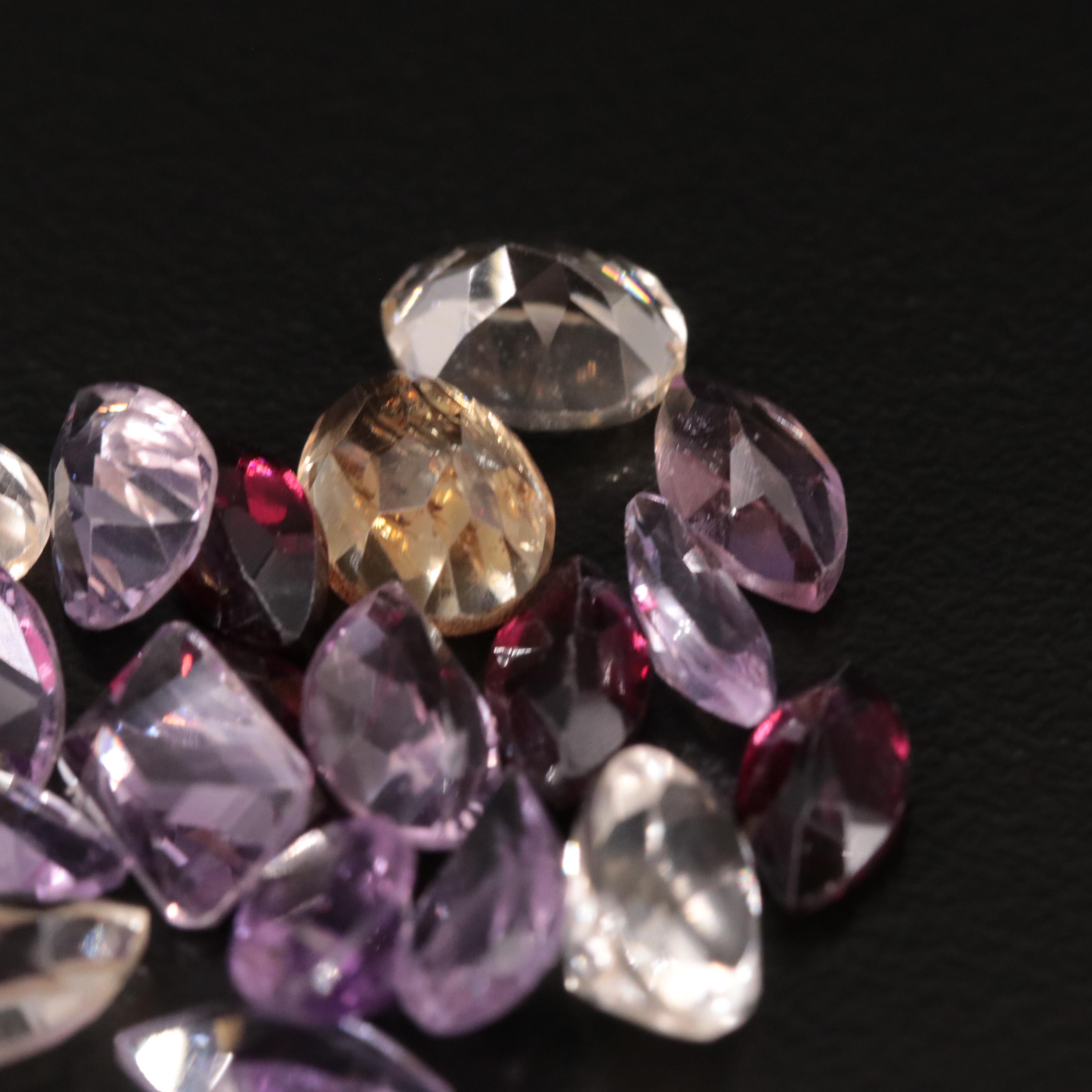 Loose 15.78 CTW Amethyst, Citrine and Garnet Lot