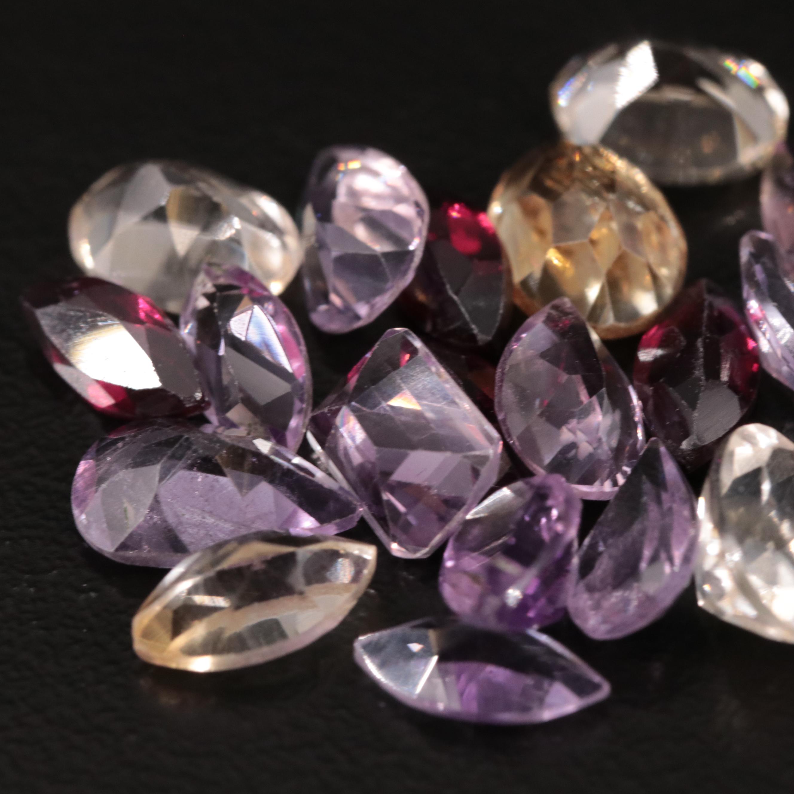 Loose 15.78 CTW Amethyst, Citrine and Garnet Lot