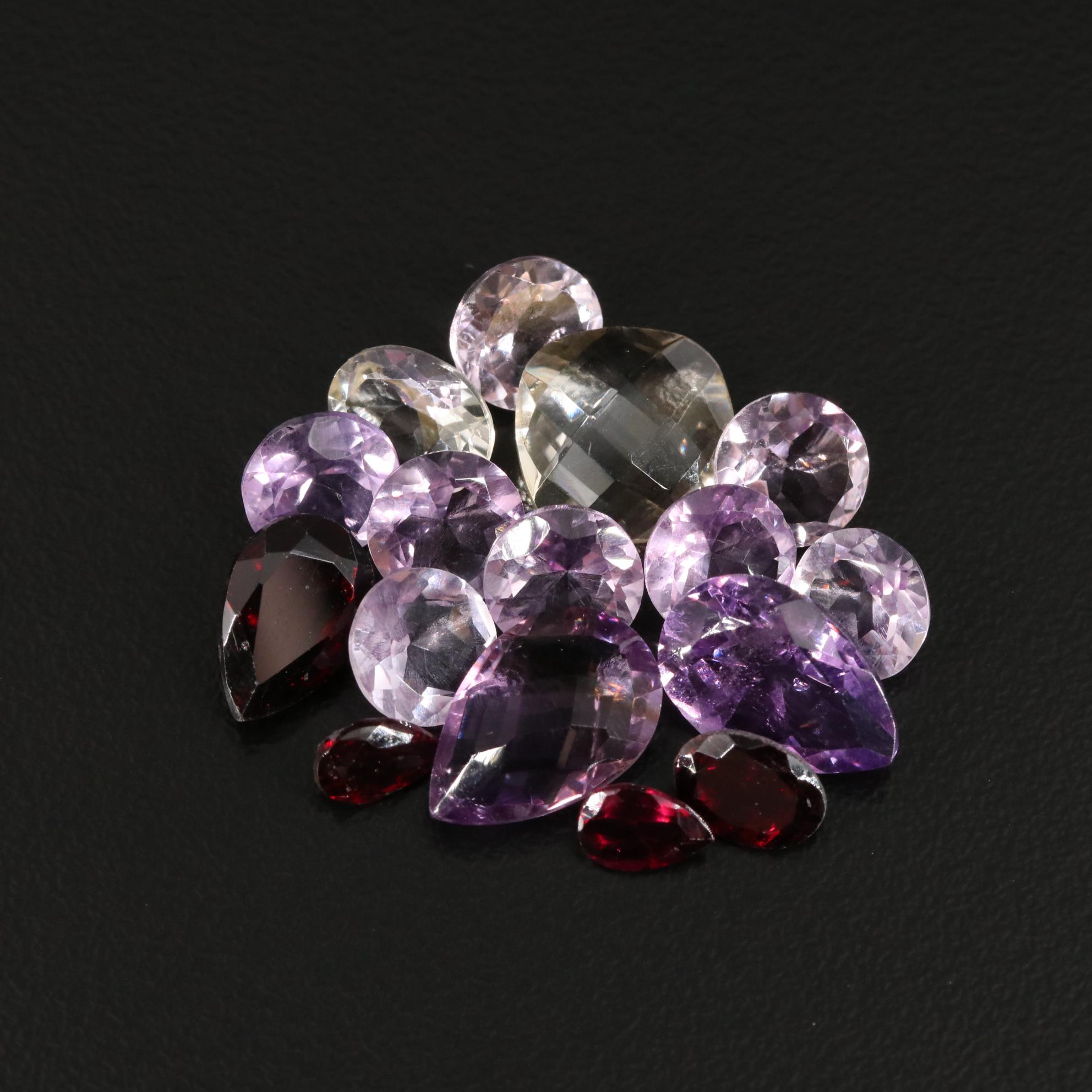 Loose 21.70 CTW Amethyst, Citrine, and Garnet Lot