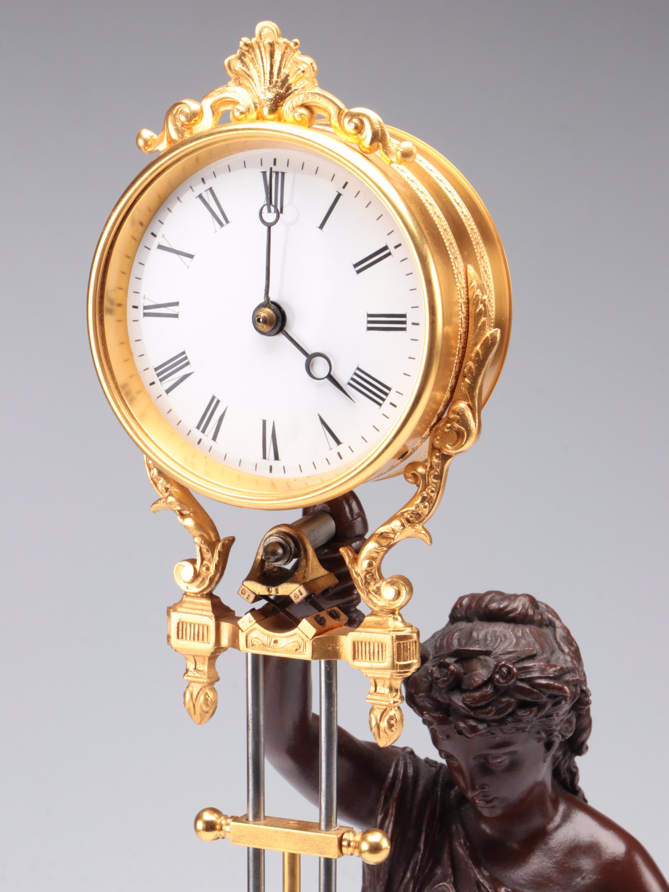 French Empire Style Gilt Bronze and Bronzed Metal Figural Pendule Clock