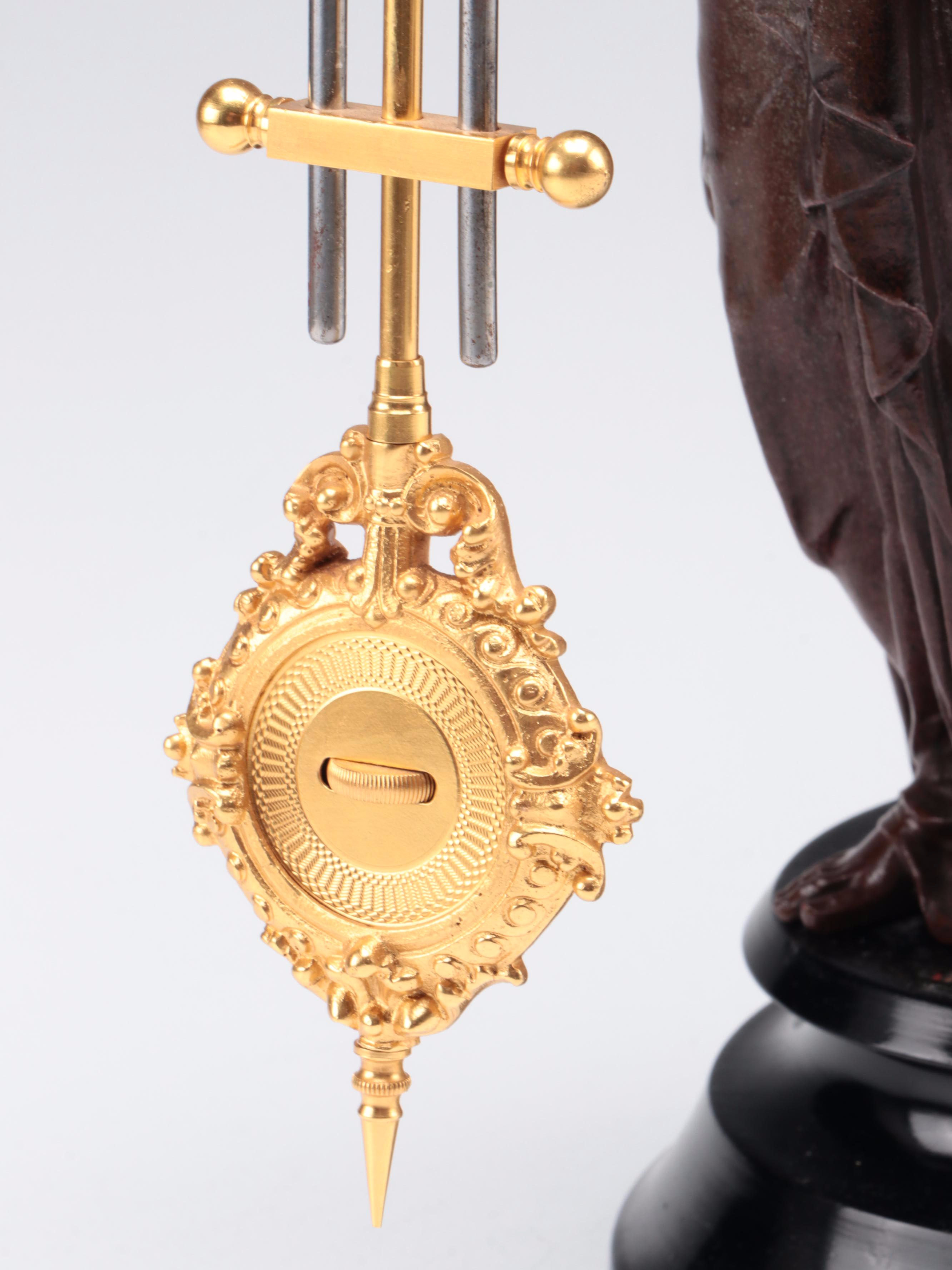 French Empire Style Gilt Bronze and Bronzed Metal Figural Pendule Clock