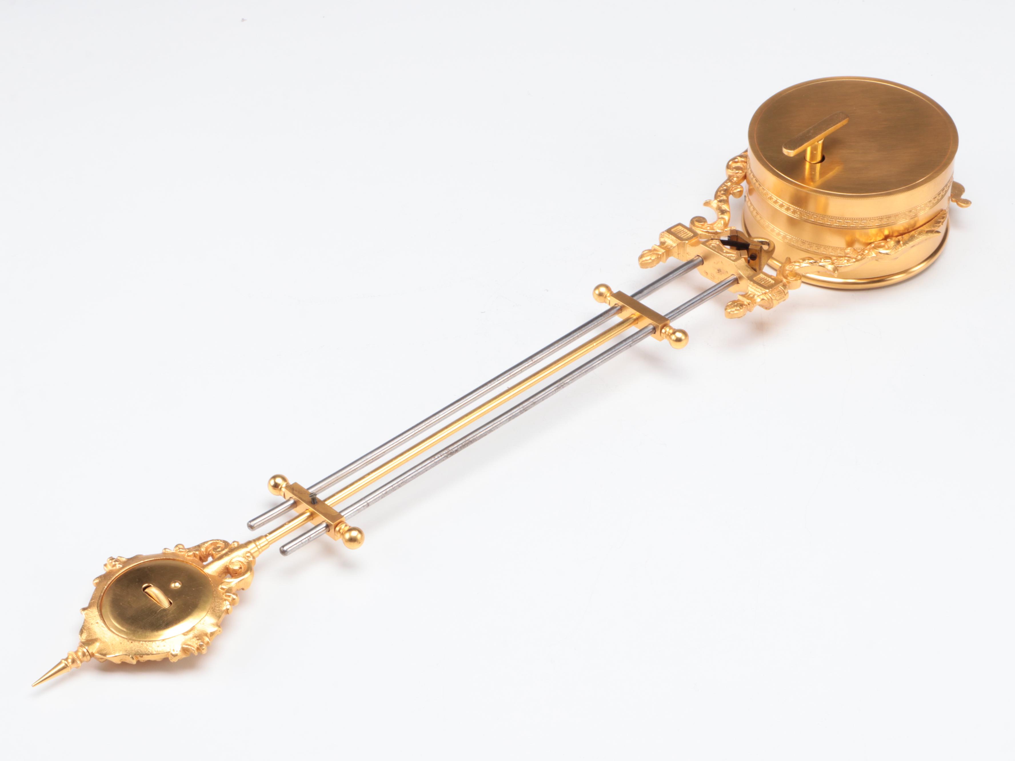 French Empire Style Gilt Bronze and Bronzed Metal Figural Pendule Clock