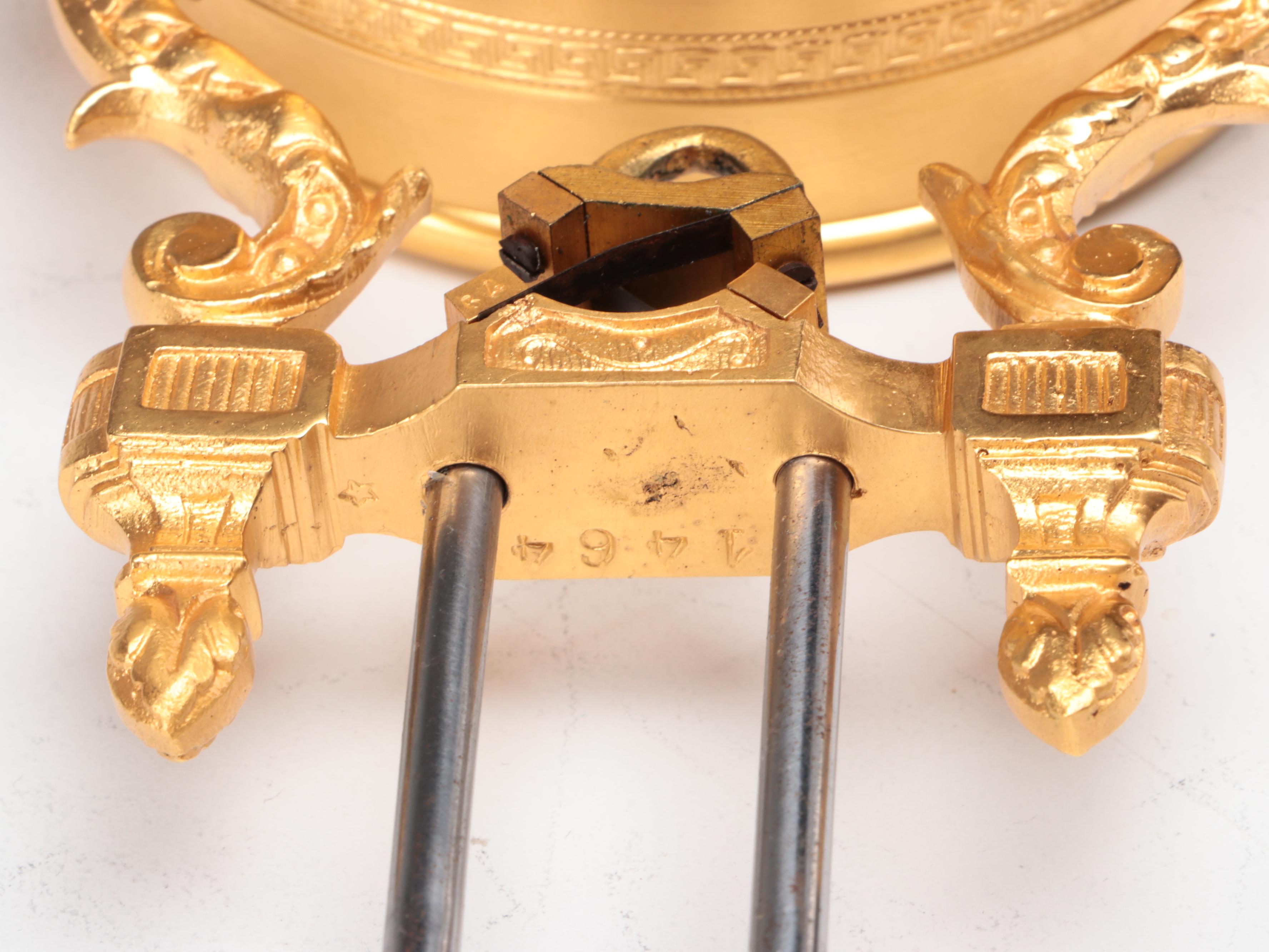 French Empire Style Gilt Bronze and Bronzed Metal Figural Pendule Clock