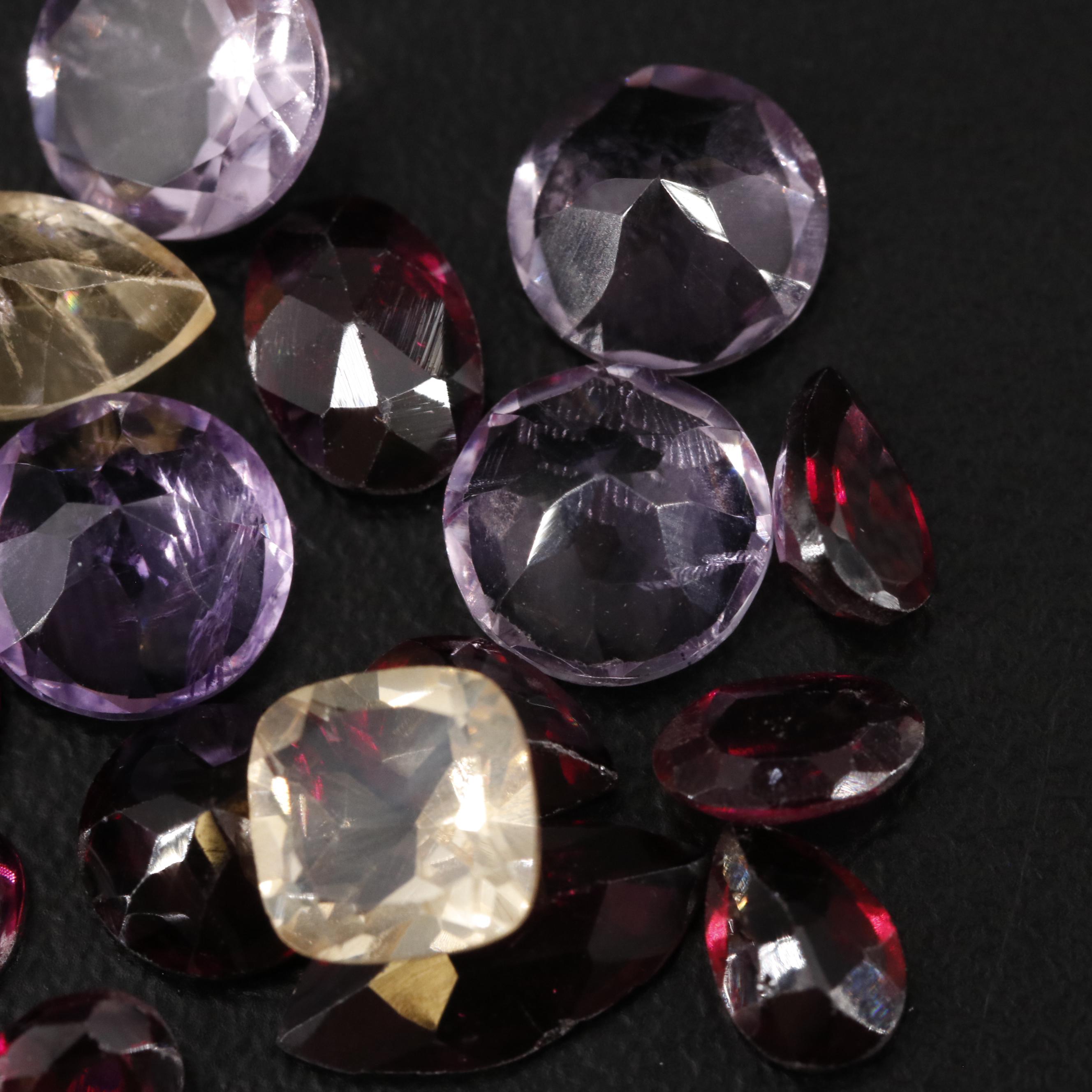 Loose 16.85 CTW Amethyst, Citrine and Garnet Lot