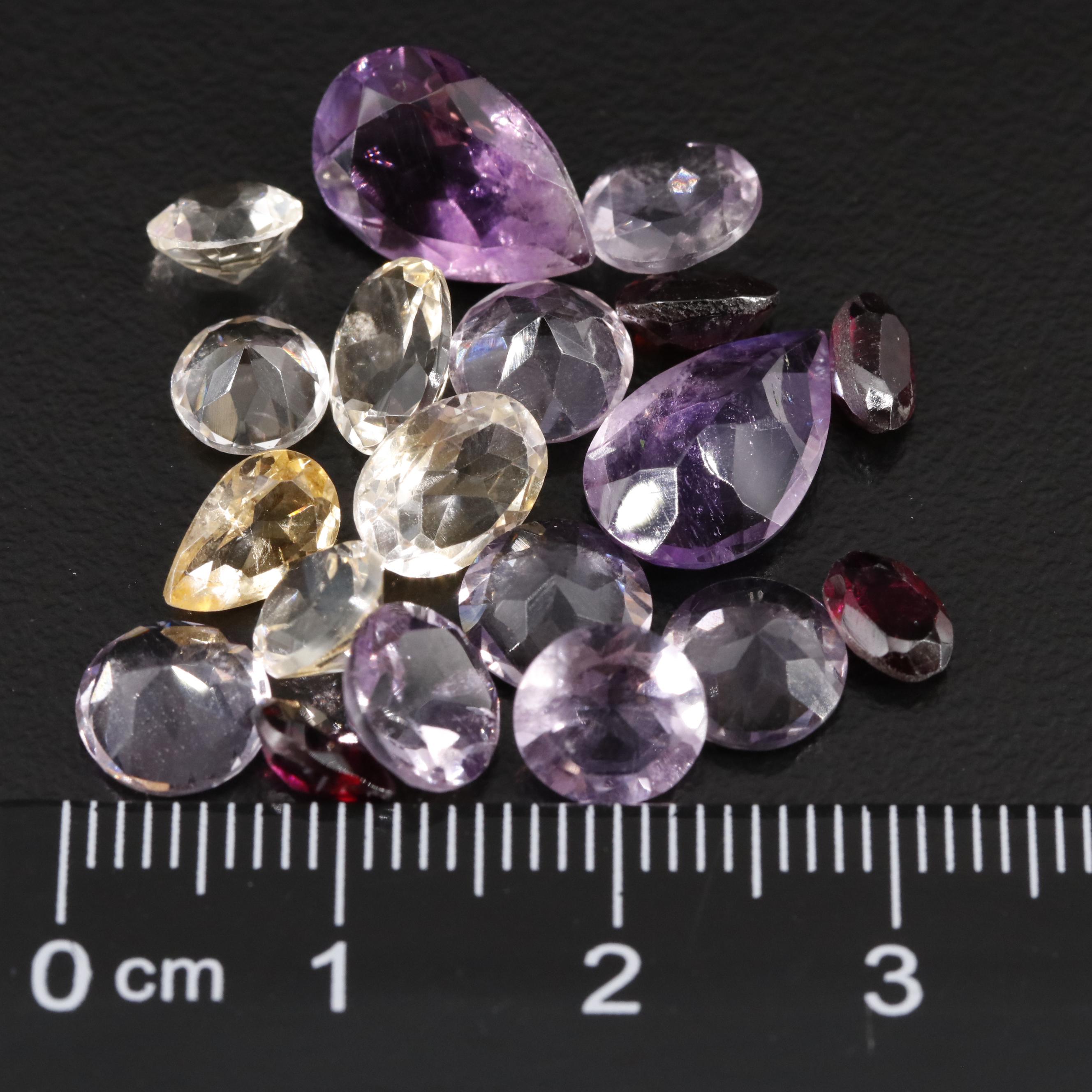 Loose 19.97 CTW Amethyst, Citrine and Garnet Lot