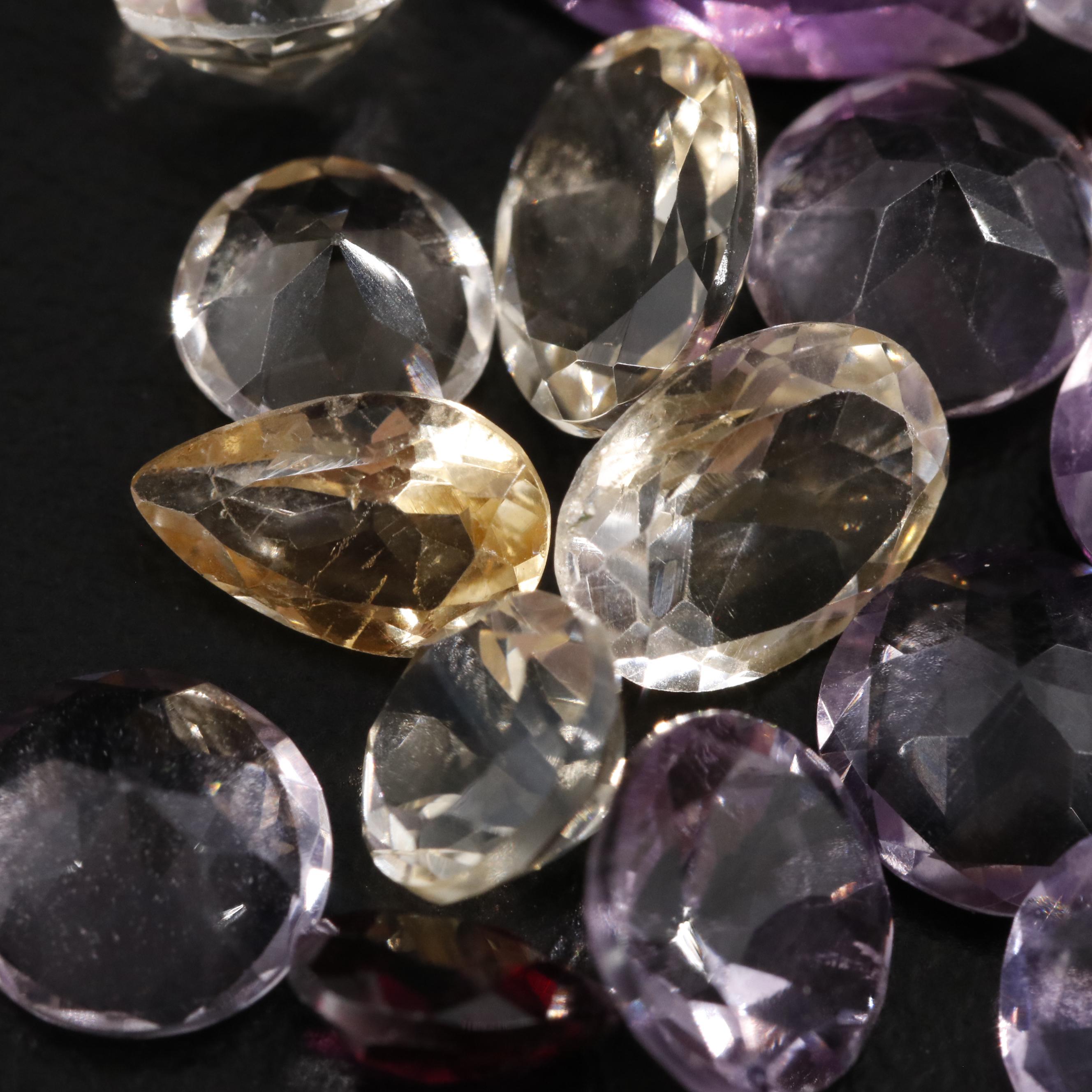 Loose 19.97 CTW Amethyst, Citrine and Garnet Lot