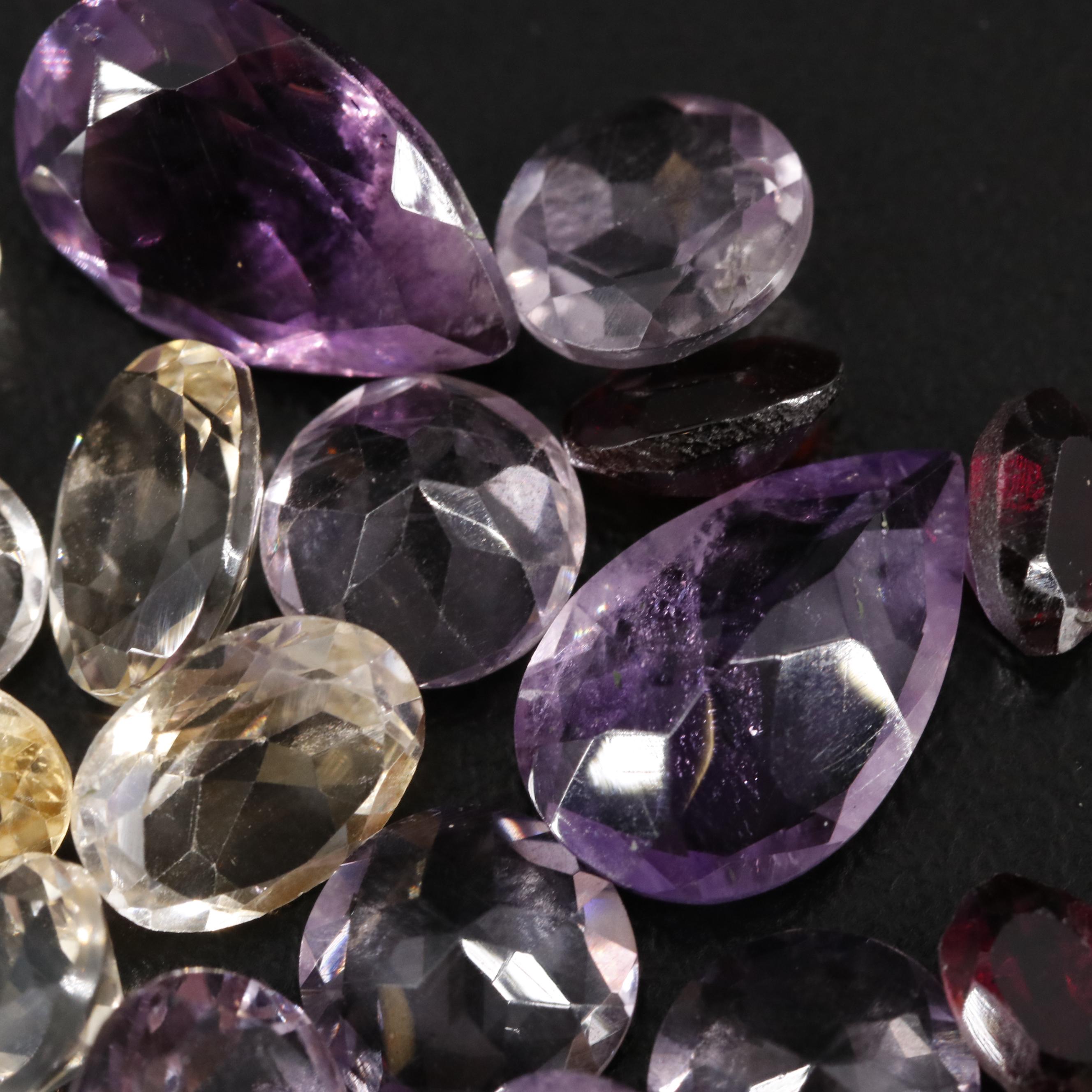 Loose 19.97 CTW Amethyst, Citrine and Garnet Lot