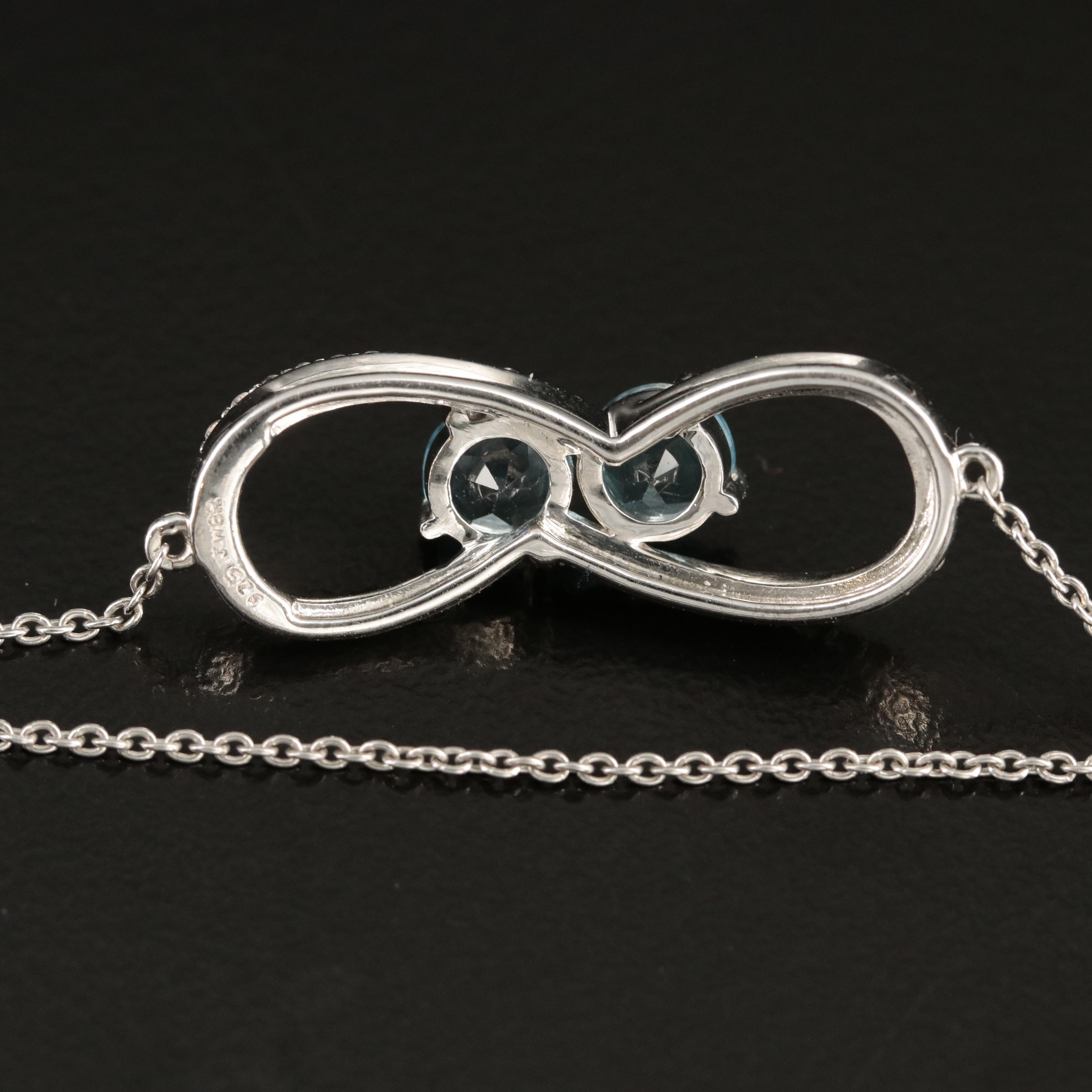 Sterling Swiss Blue and White Topaz Stationary Bracelet