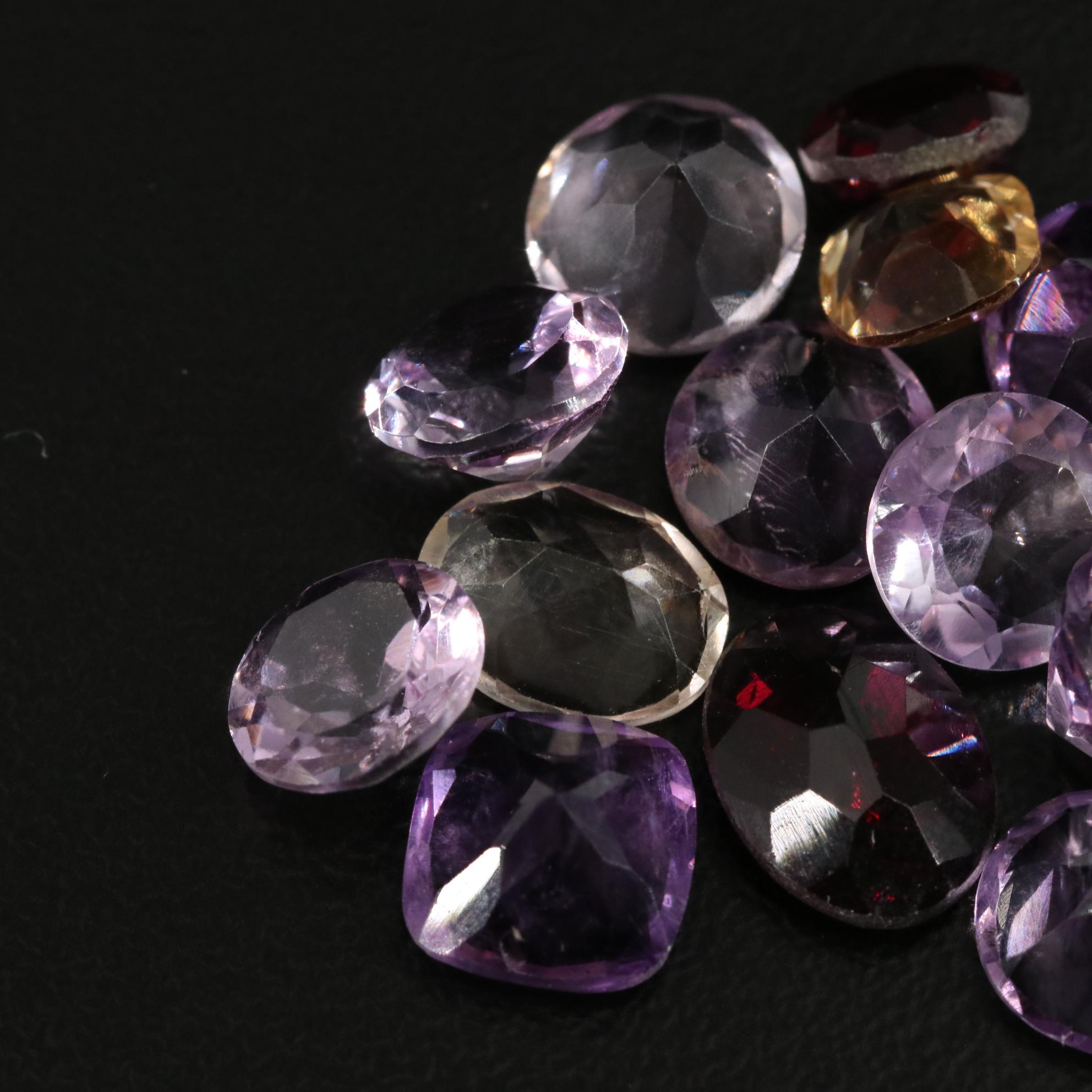 Loose 21.78 CTW Amethyst, Citrine, and Garnet Lot