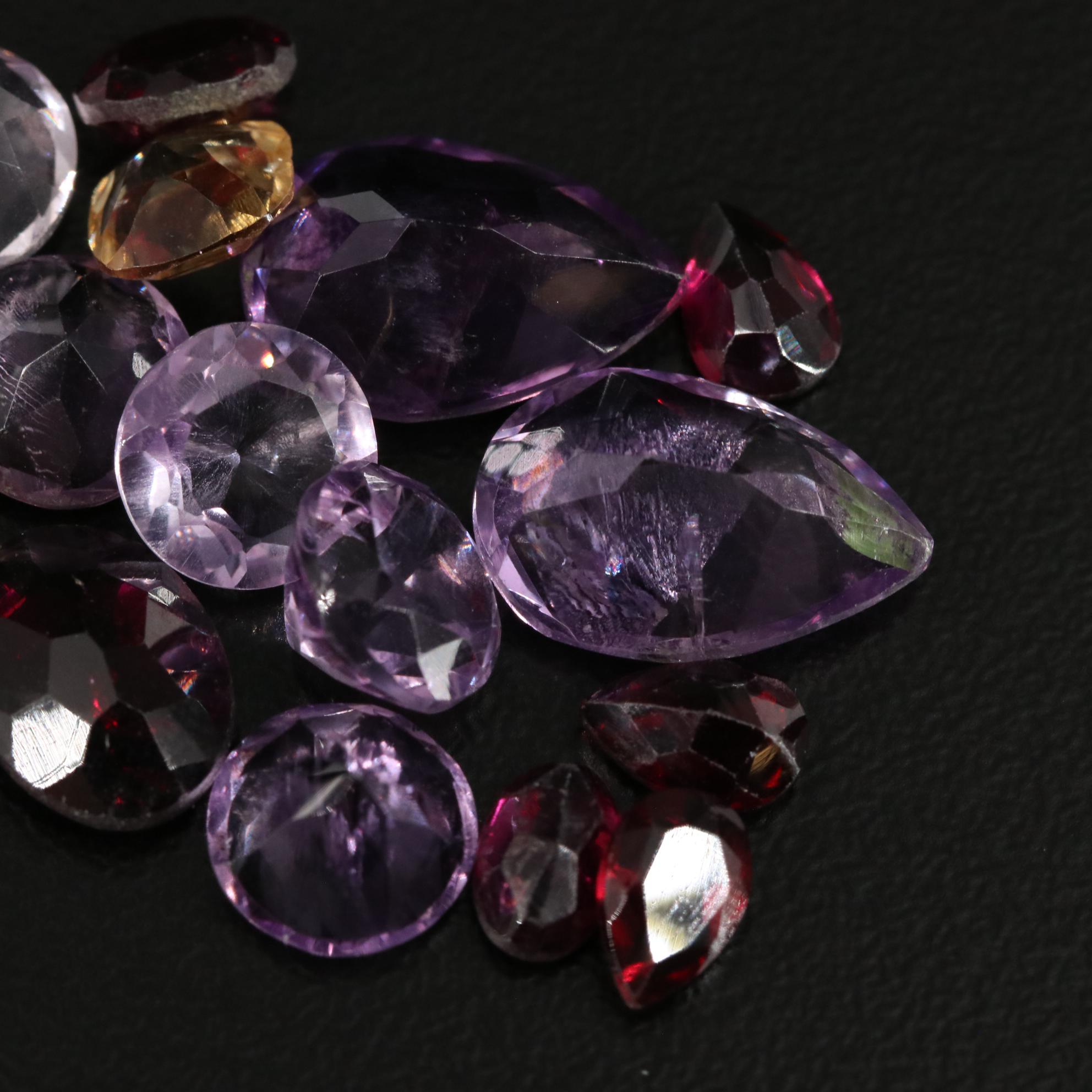 Loose 21.78 CTW Amethyst, Citrine, and Garnet Lot