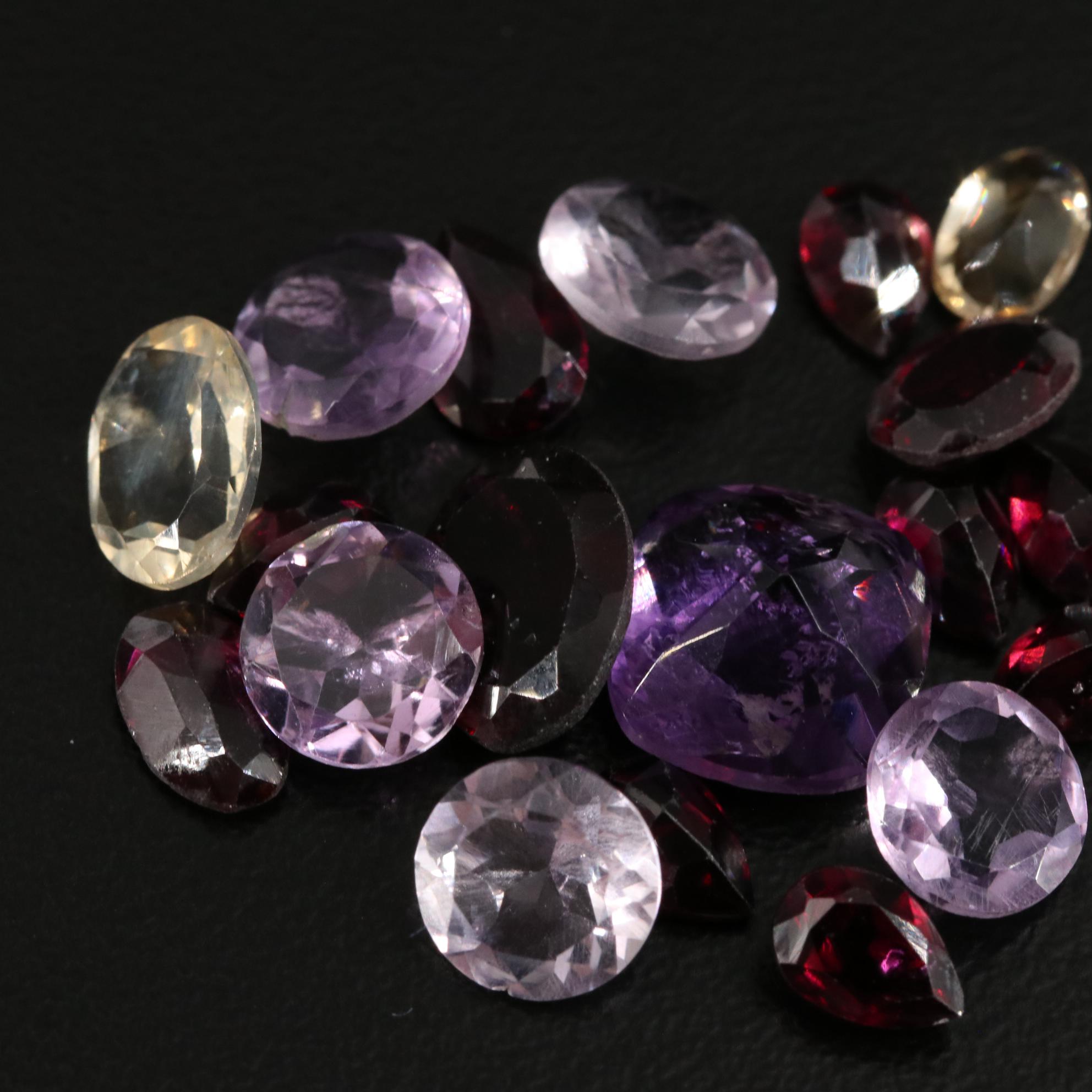 Loose 25.00 CTW Amethyst, Citrine, and Garnet Lot