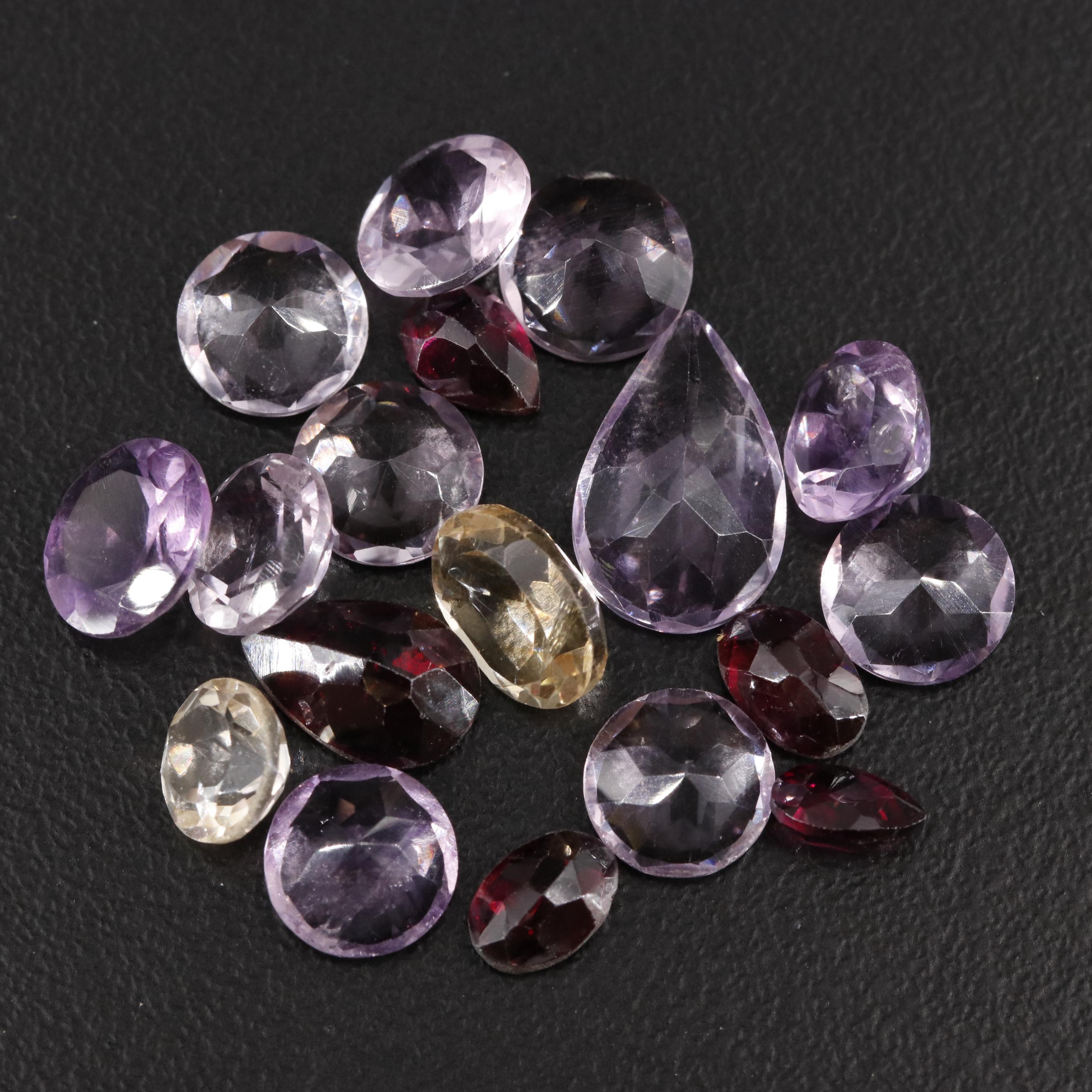 Loose 19.61 CTW Amethyst, Garnet, and Citrine Lot