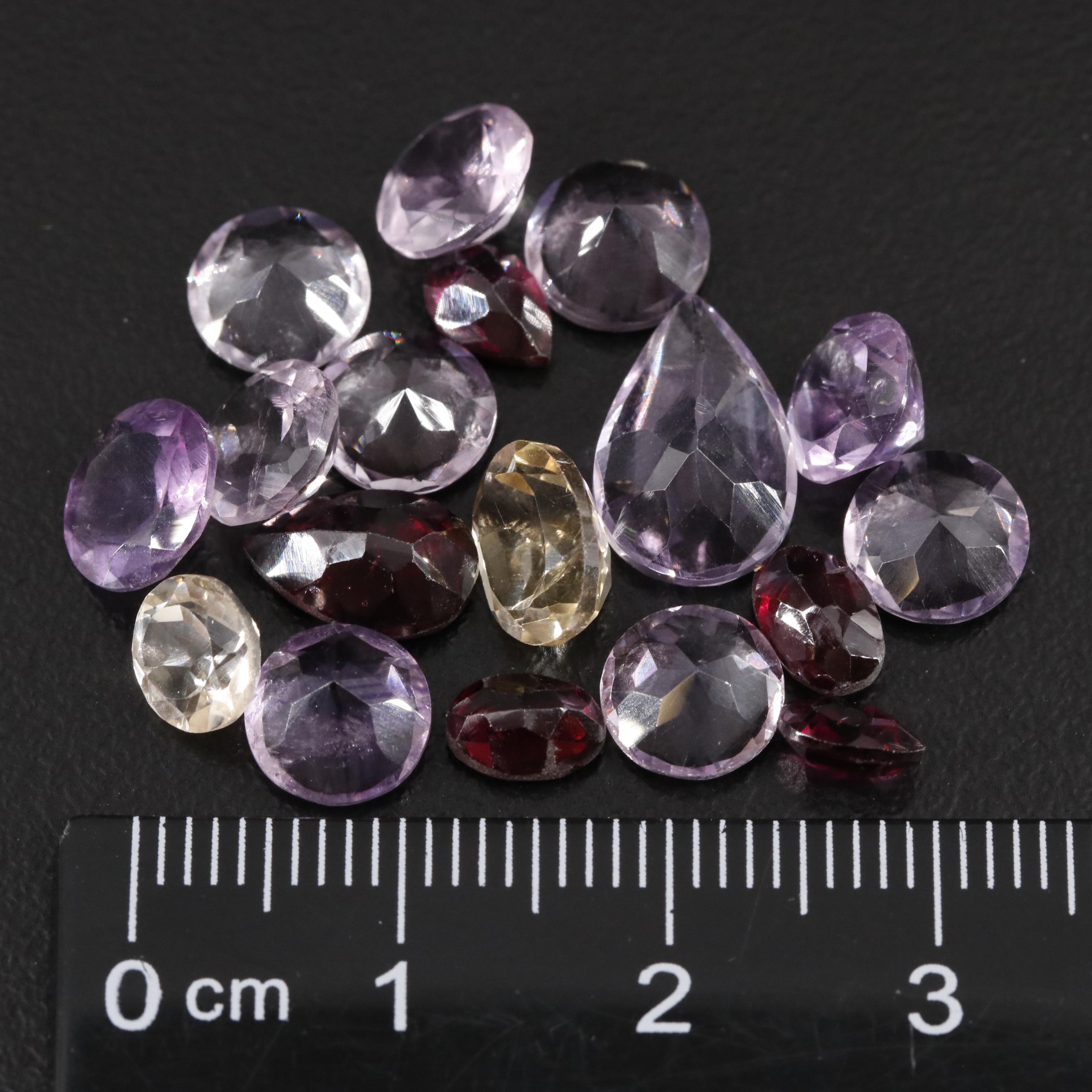 Loose 19.61 CTW Amethyst, Garnet, and Citrine Lot