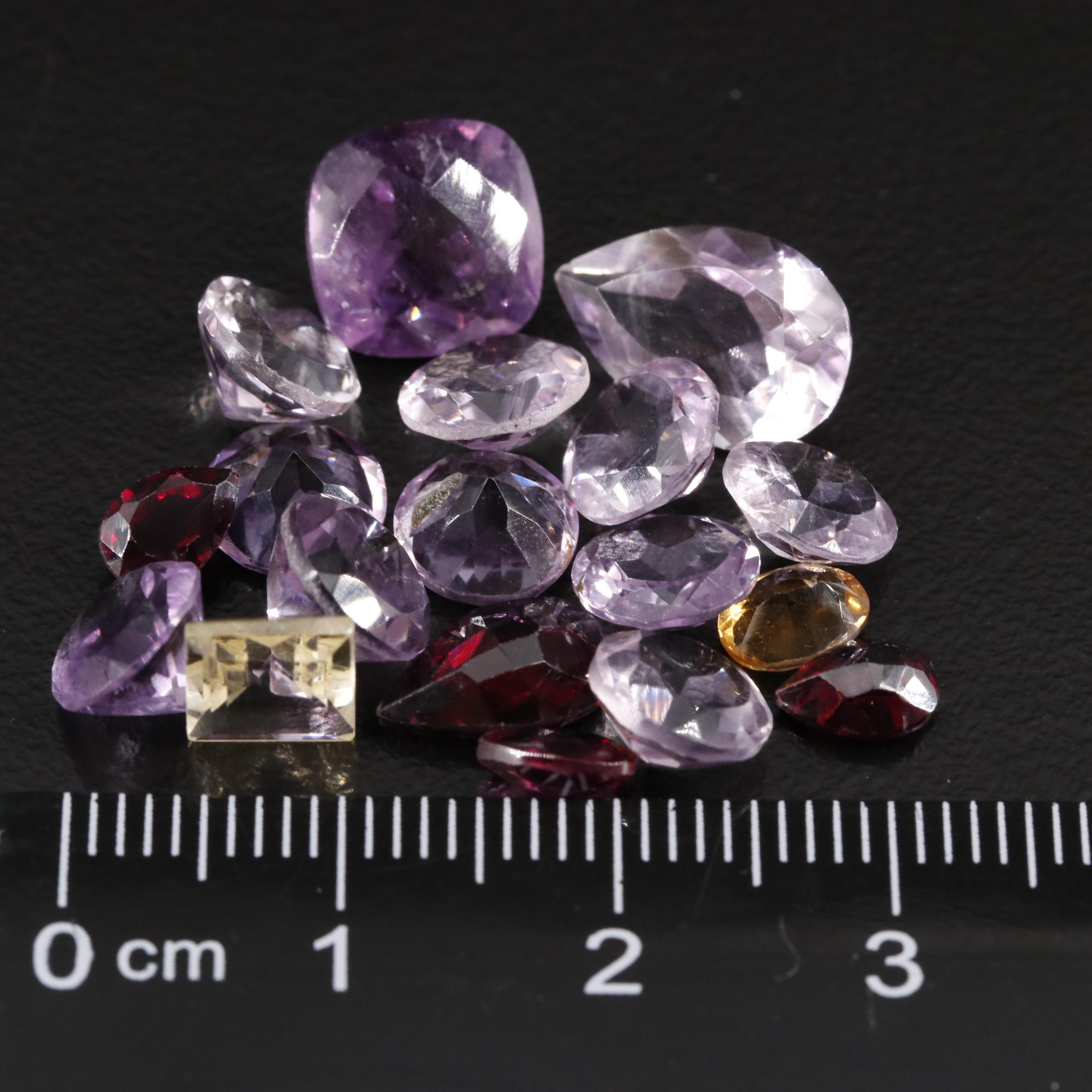 Loose 21.66 CTW Amethyst, Citrine and Garnet Lot