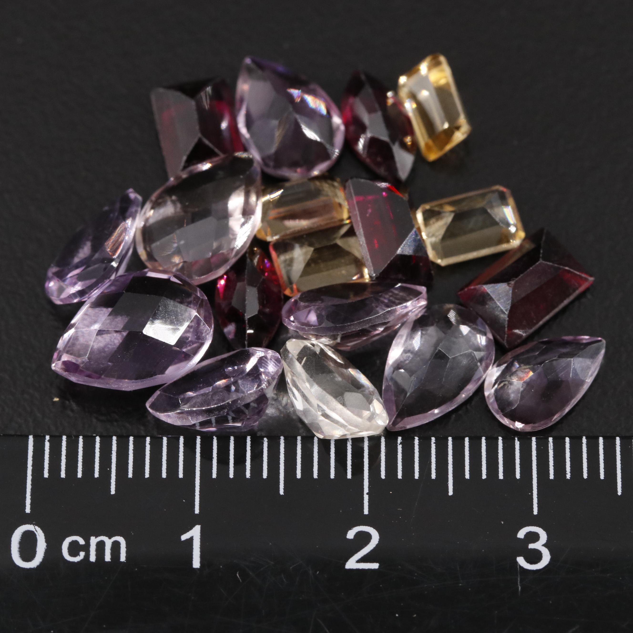 Loose 19.02 CTW Amethyst, Citrine and Garnet Lot