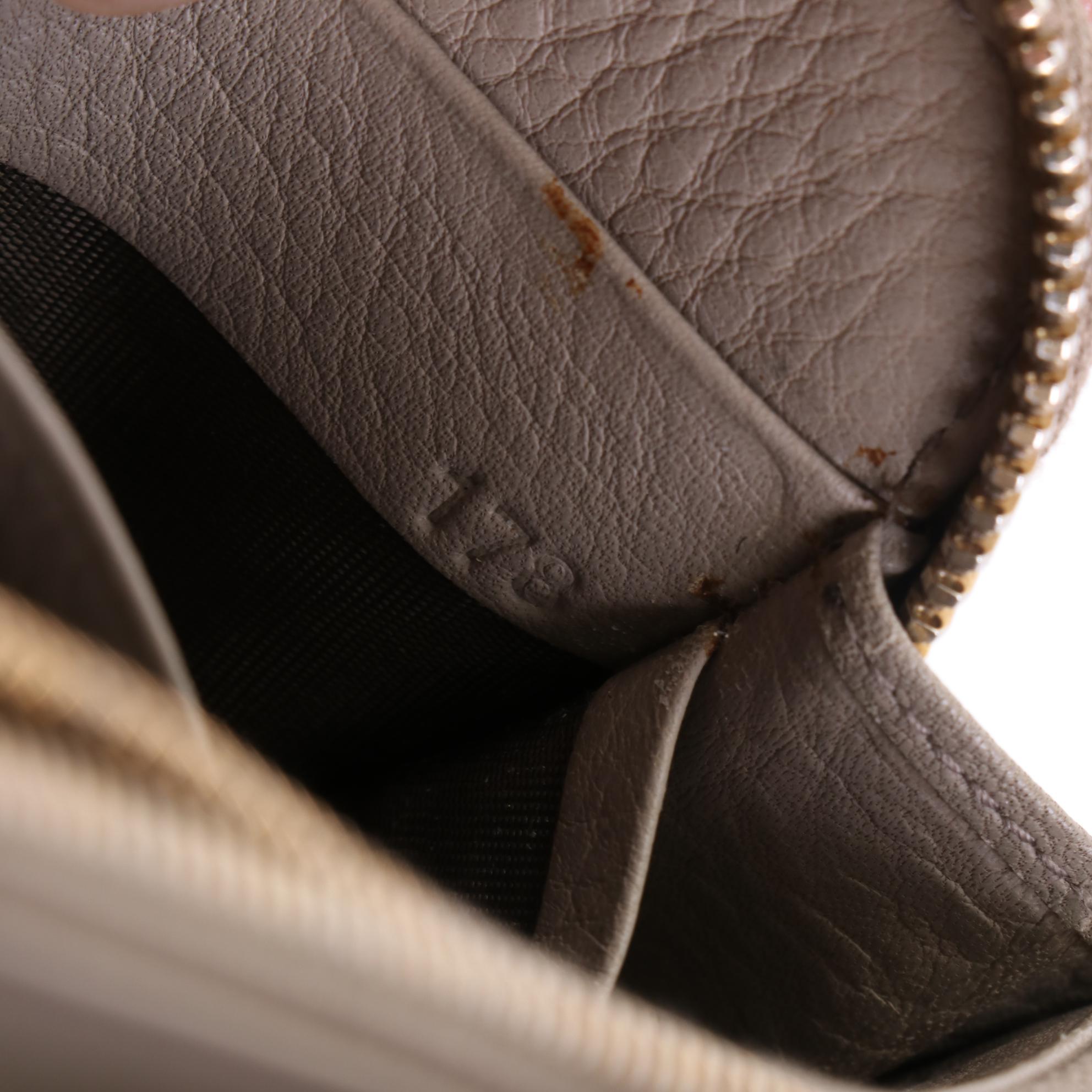 Prada Zip Around Wallet in Vitello Daino Leather