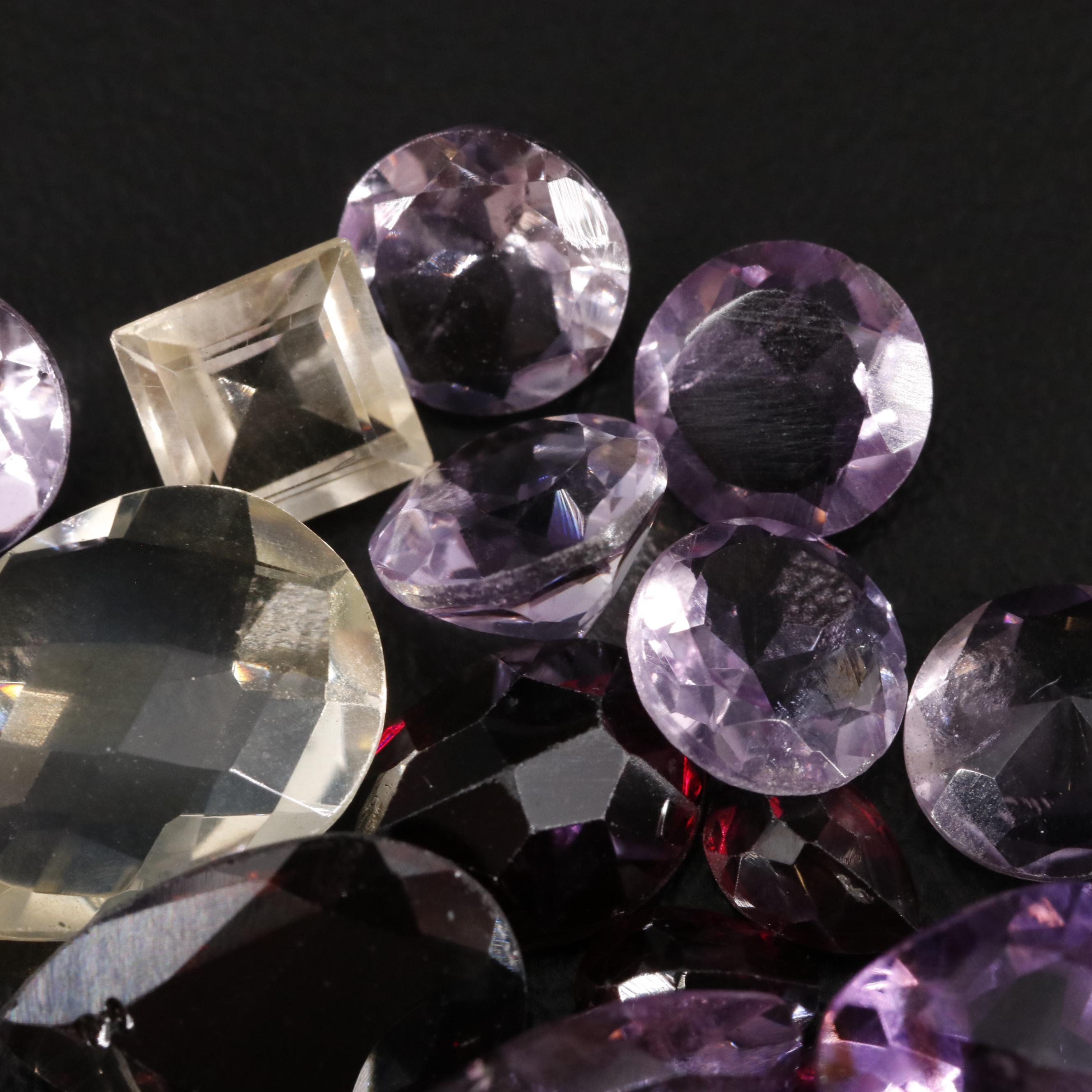 Loose 25.45 CTW Amethyst, Citrine and Garnet Lot