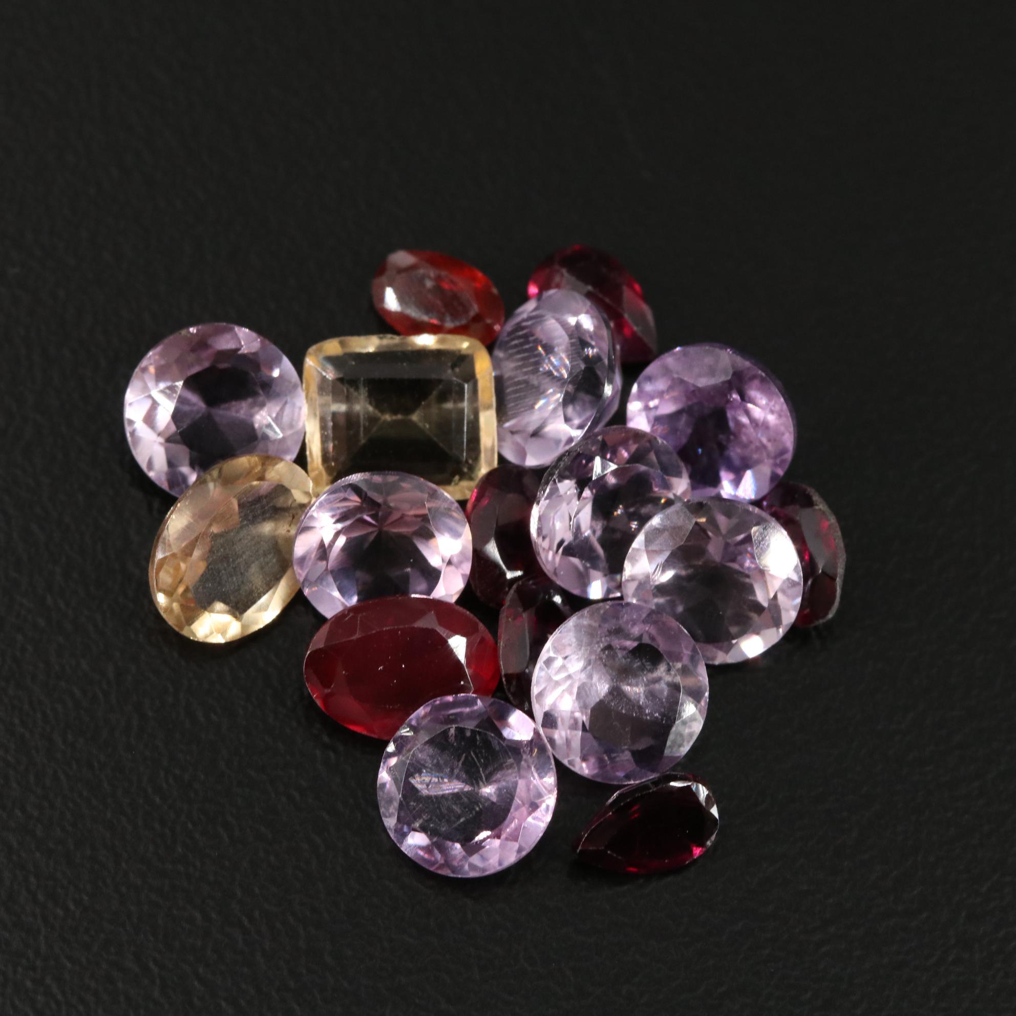 Loose 15.65 CTW Amethyst, Citrine, and Garnet Lot