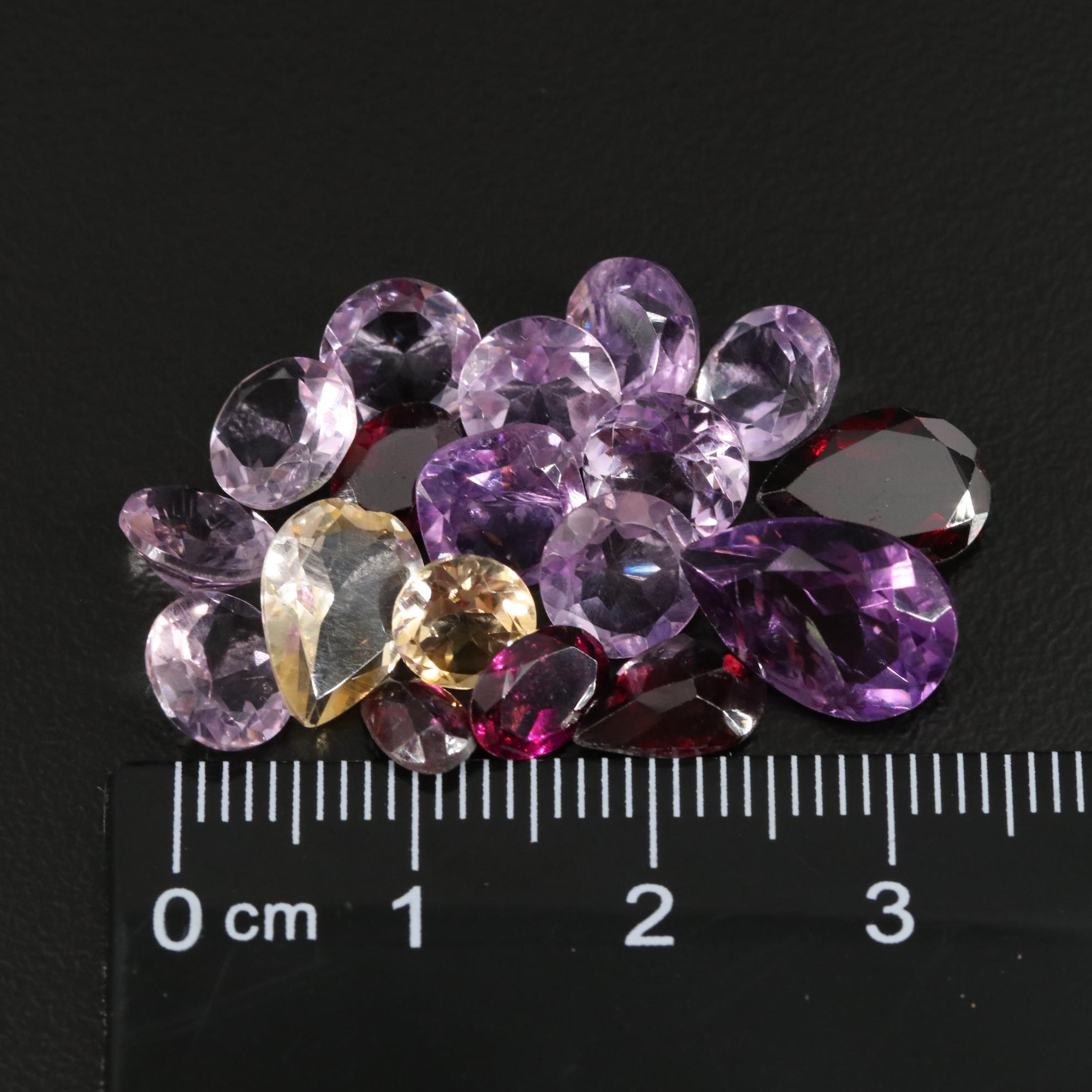 Loose 22.16 CTW Amethyst, Citrine and Garnet Lot