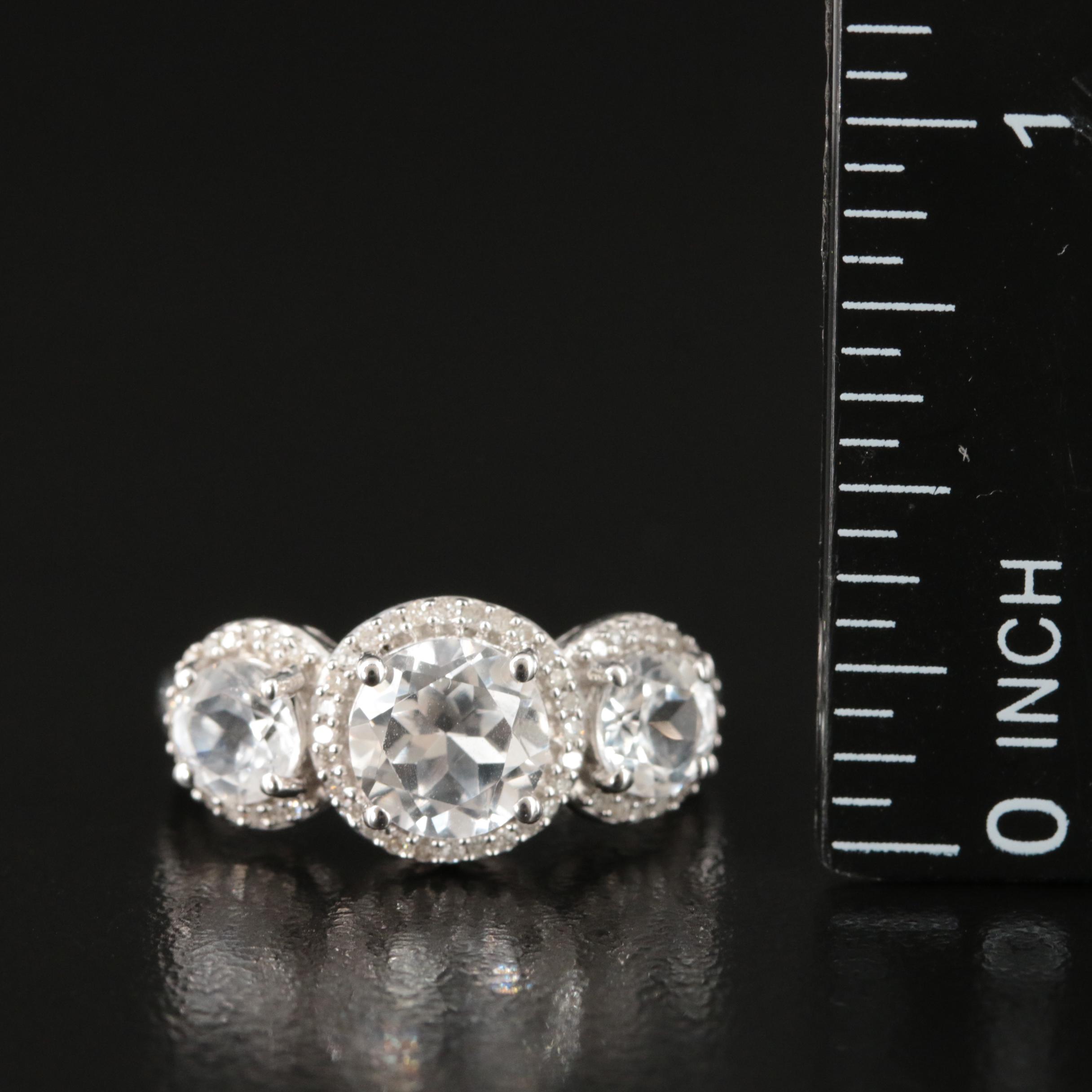 Sterling Sapphire and Diamond Three Stone Halo Ring