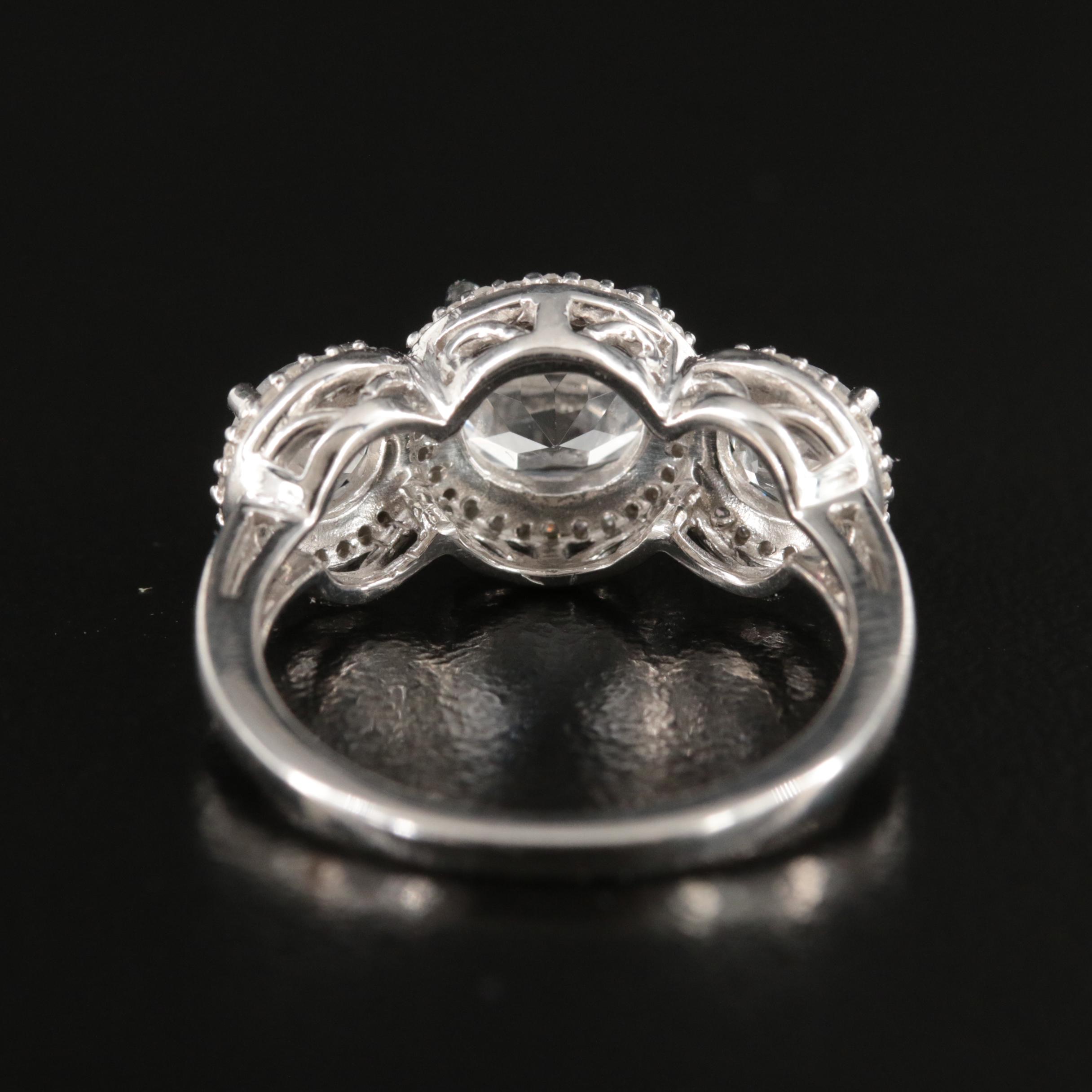 Sterling Sapphire and Diamond Three Stone Halo Ring