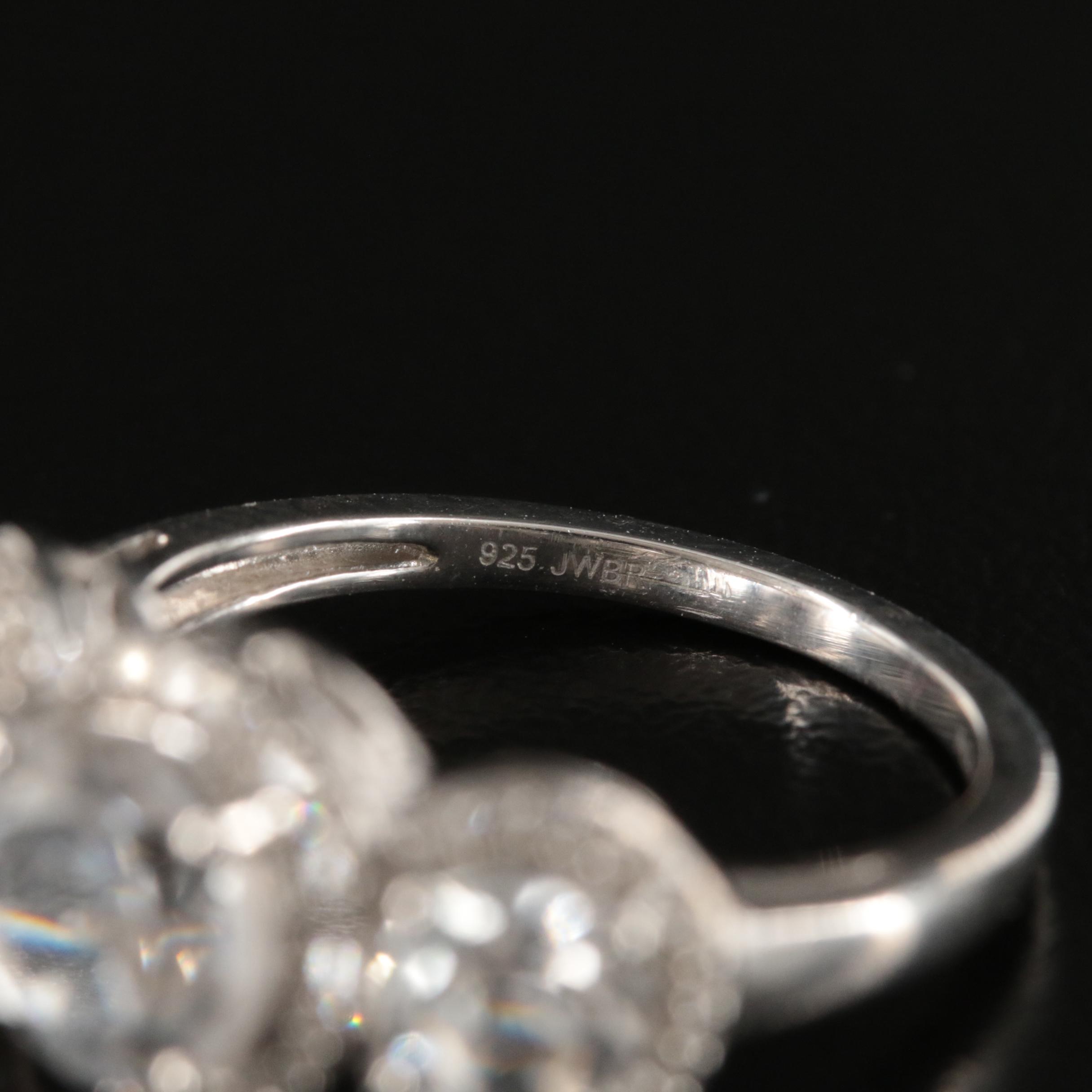 Sterling Sapphire and Diamond Three Stone Halo Ring