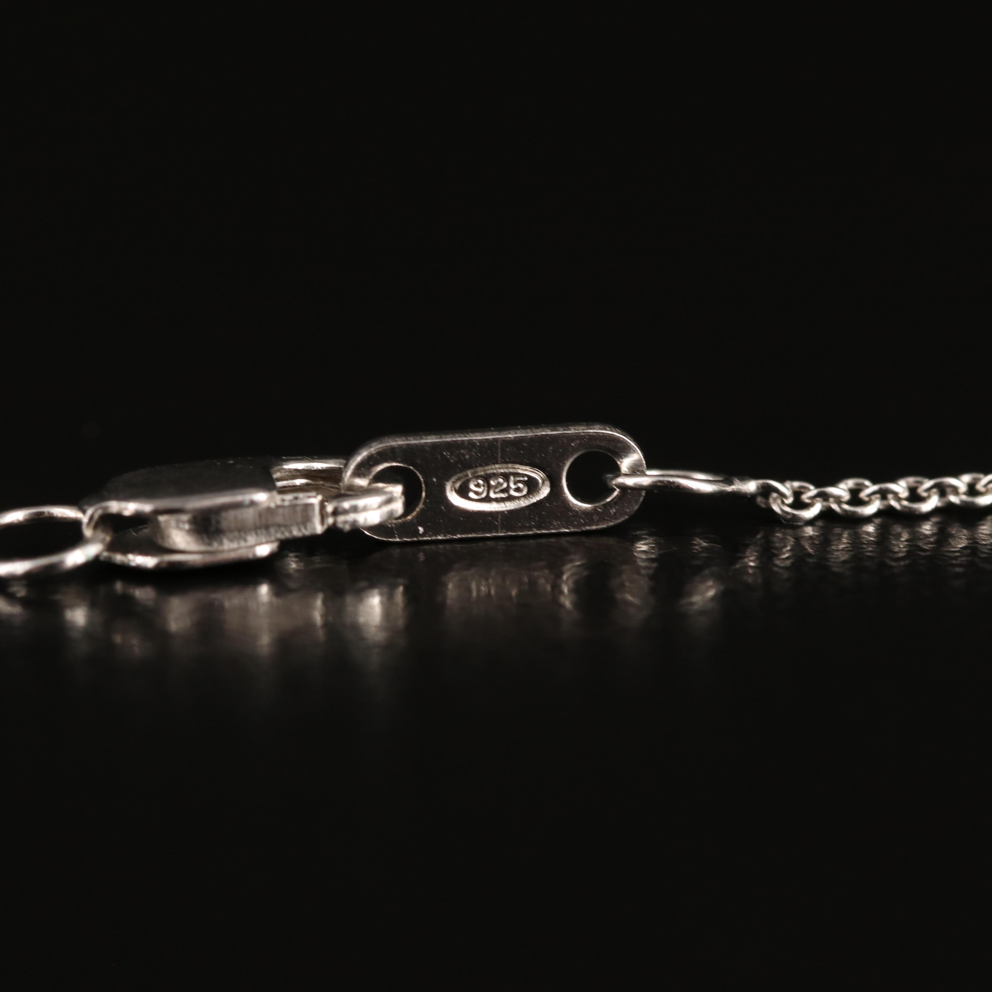 Sterling Diamond and White Sapphire Cross Necklace