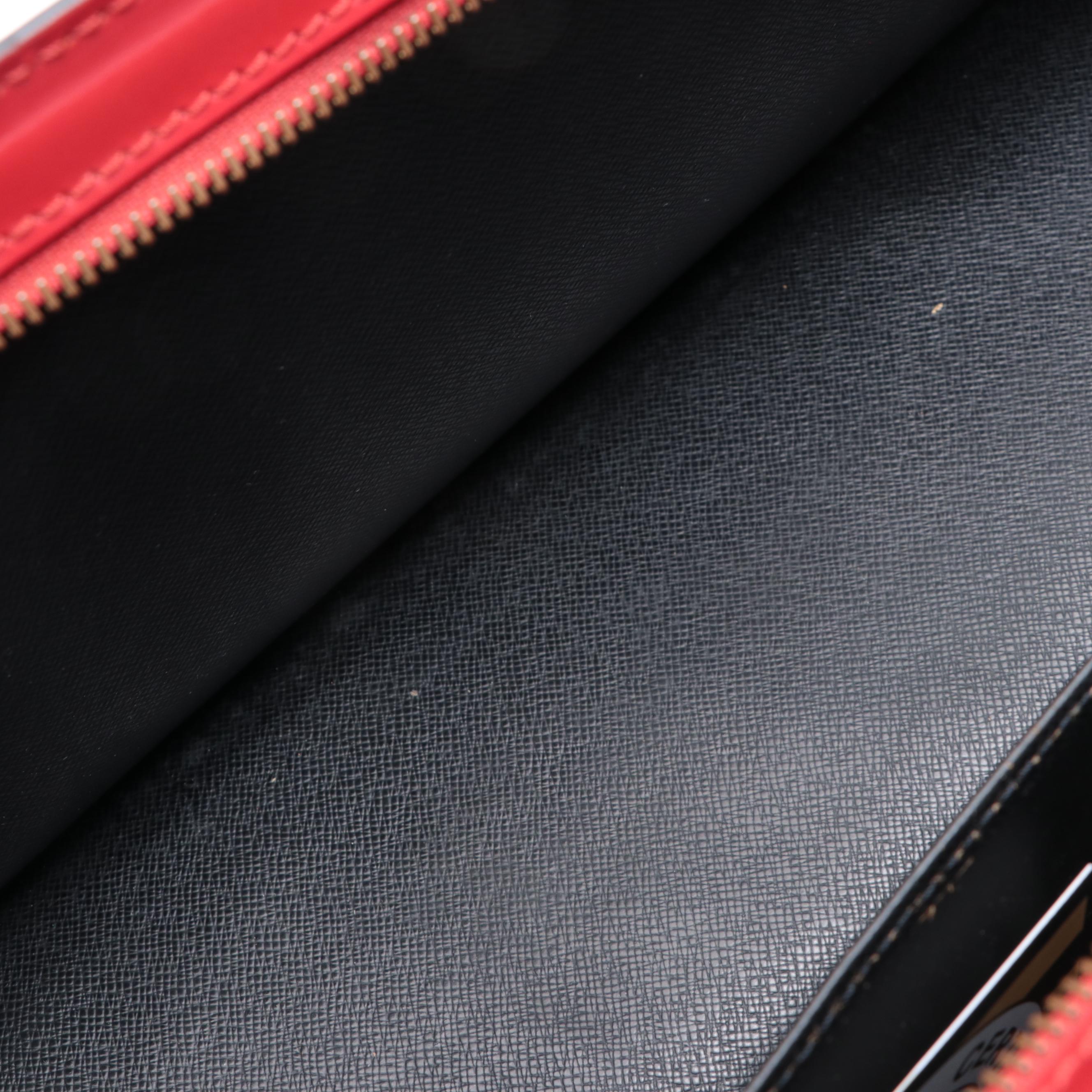 Louis Vuitton Sac Triangle Handbag in Red Epi Leather