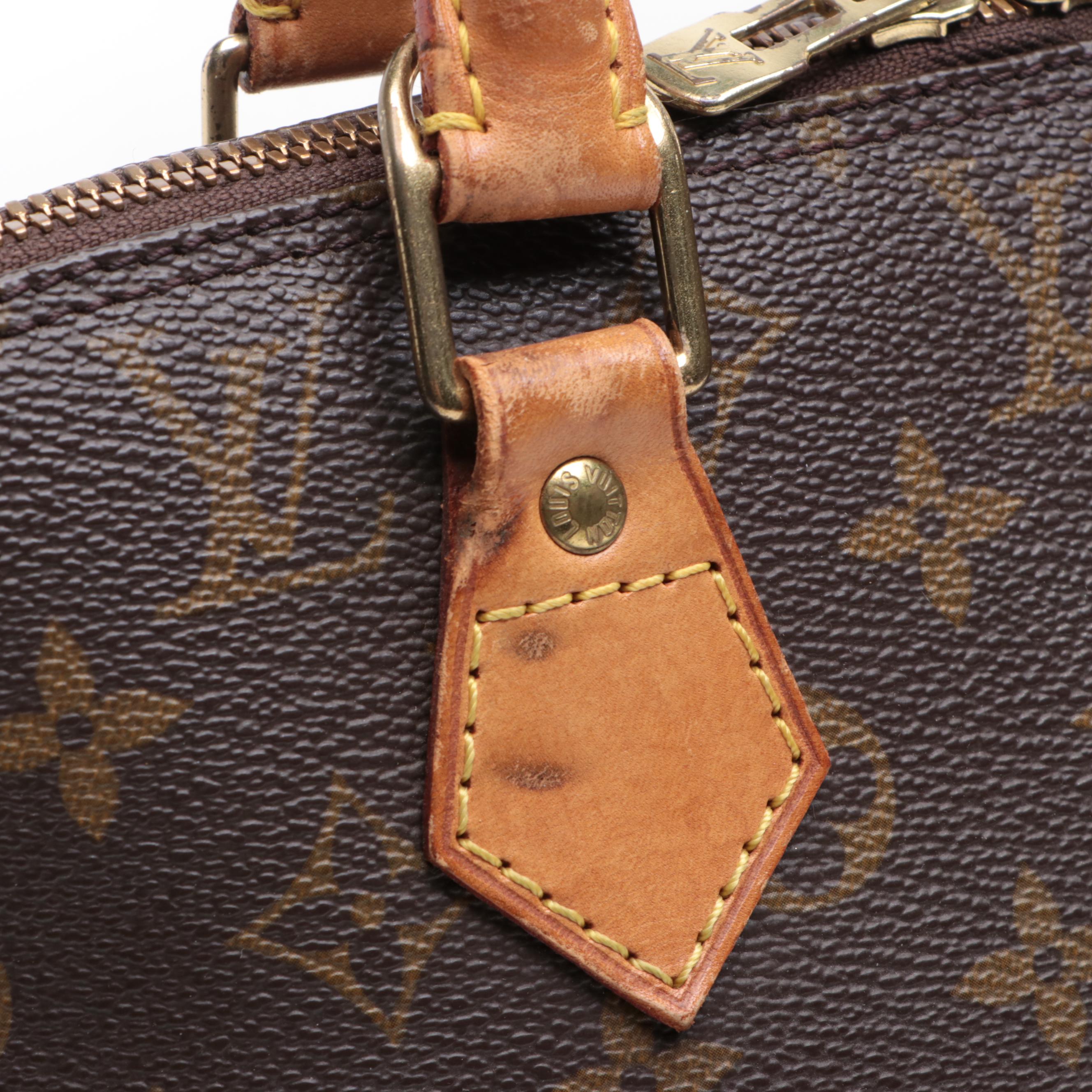 Louis Vuitton Alma PM Bag in Monogram Canvas and Leather