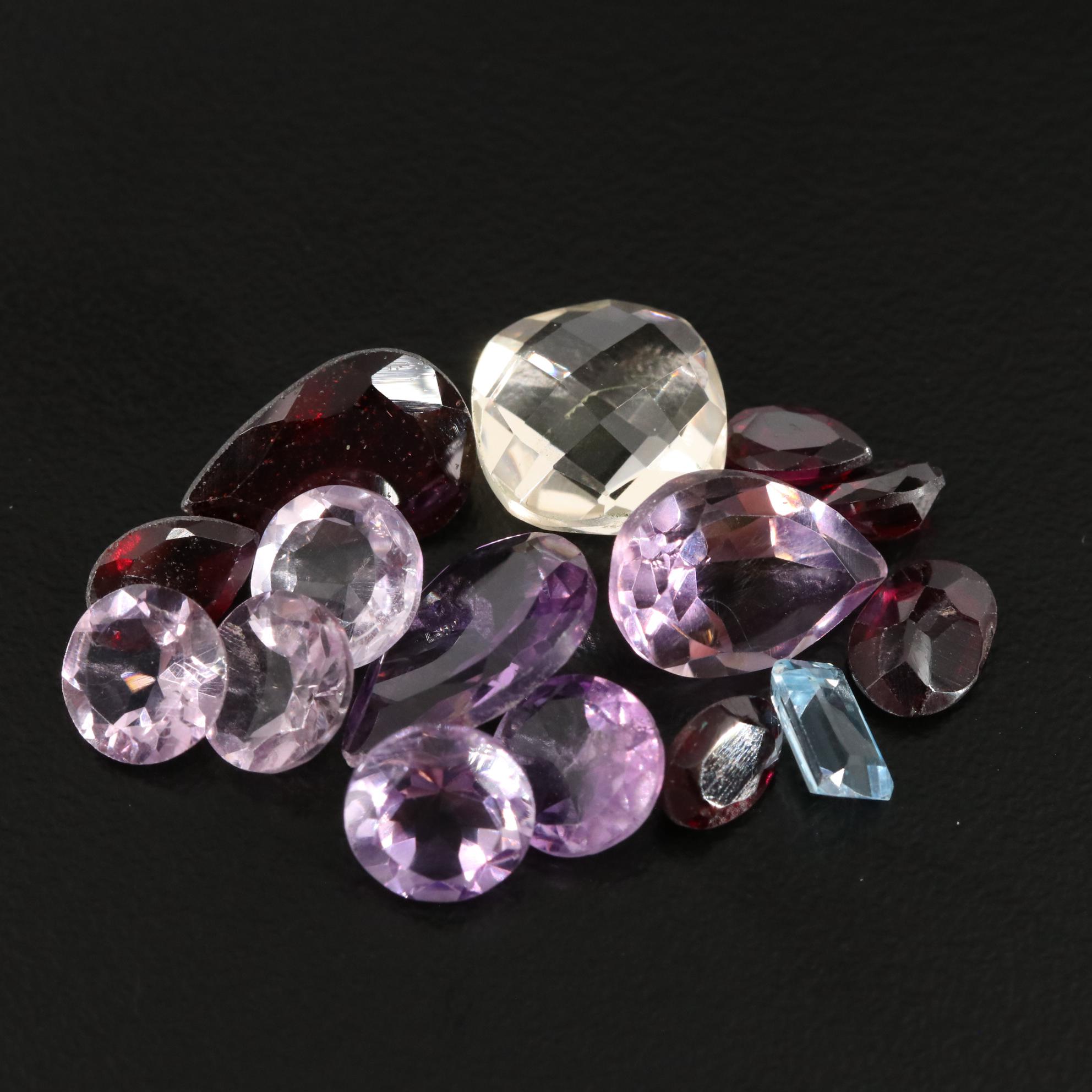 Loose 22.12 CTW Amethyst, Citrine, and Garnet Lot