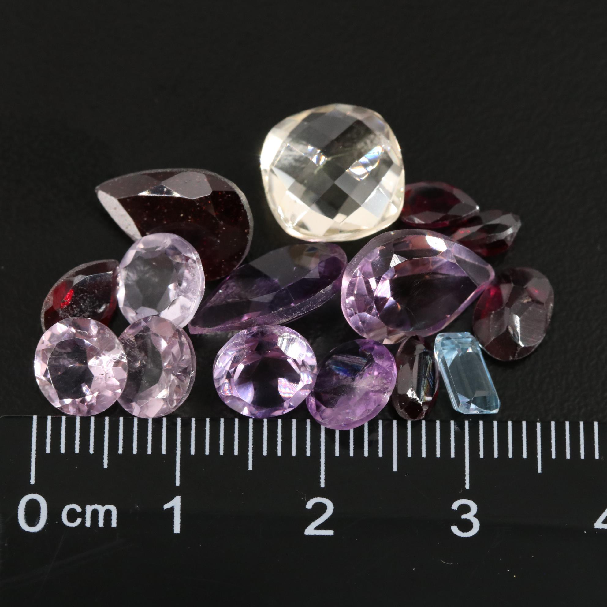 Loose 22.12 CTW Amethyst, Citrine, and Garnet Lot