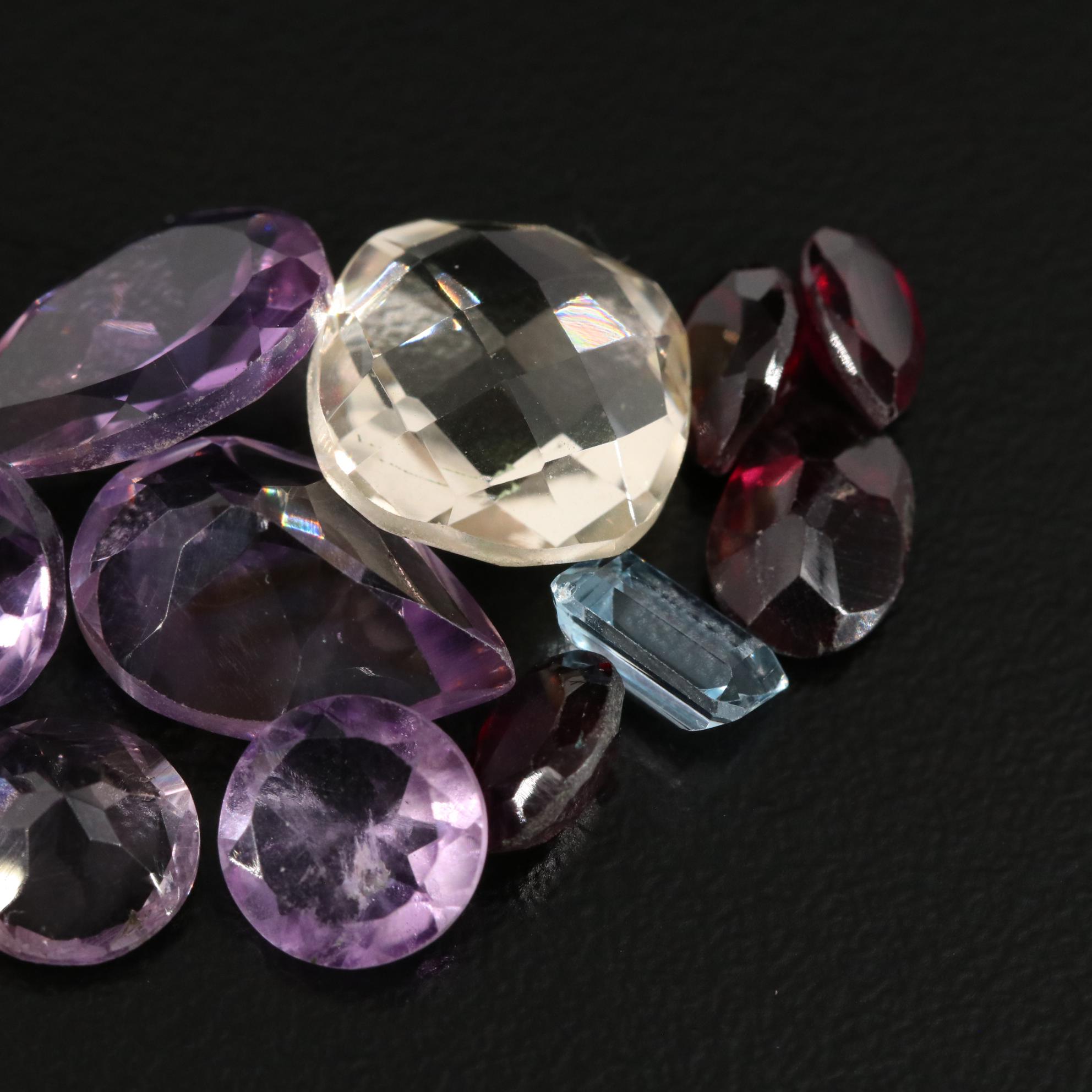 Loose 22.12 CTW Amethyst, Citrine, and Garnet Lot