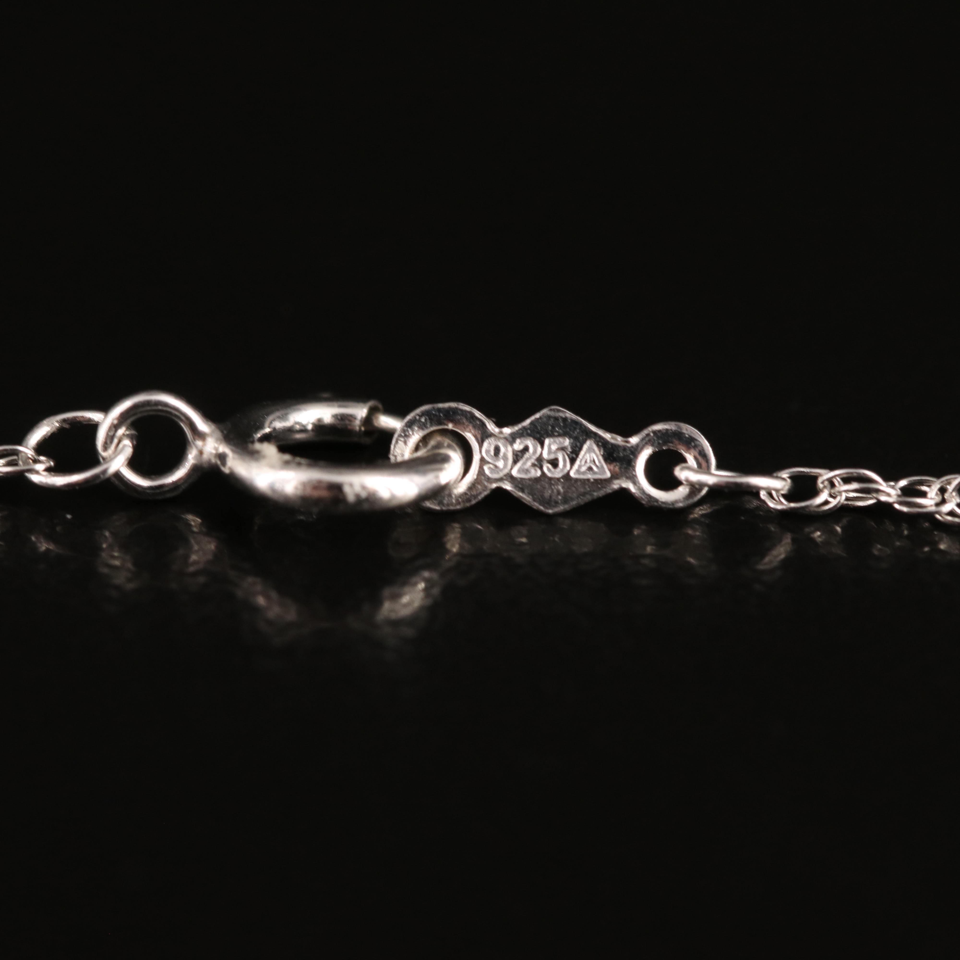 Sterling Garnet and White Topaz Teardrop Necklace