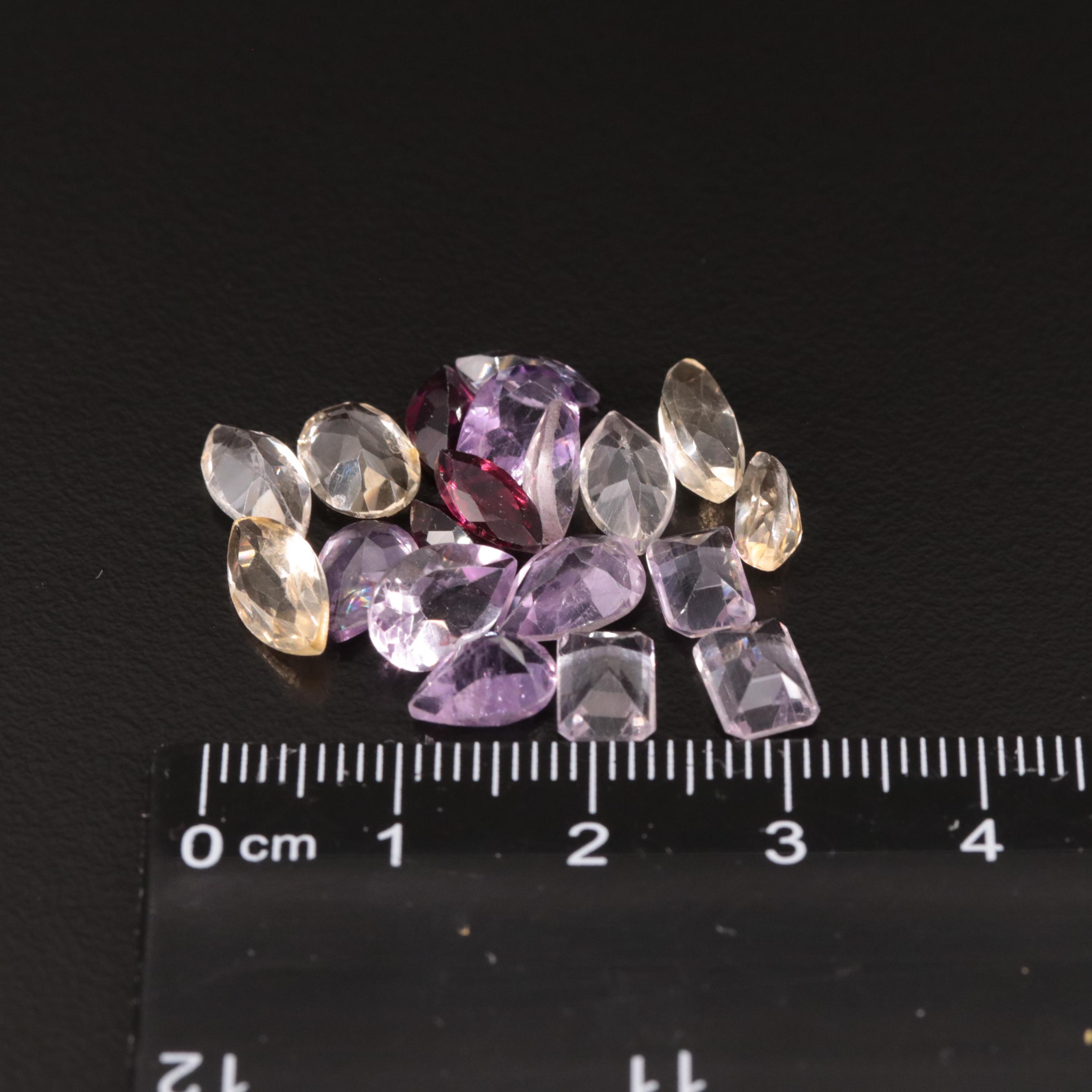 Loose 17.87 CTW Amethyst, Citrine, and Garnet Lot