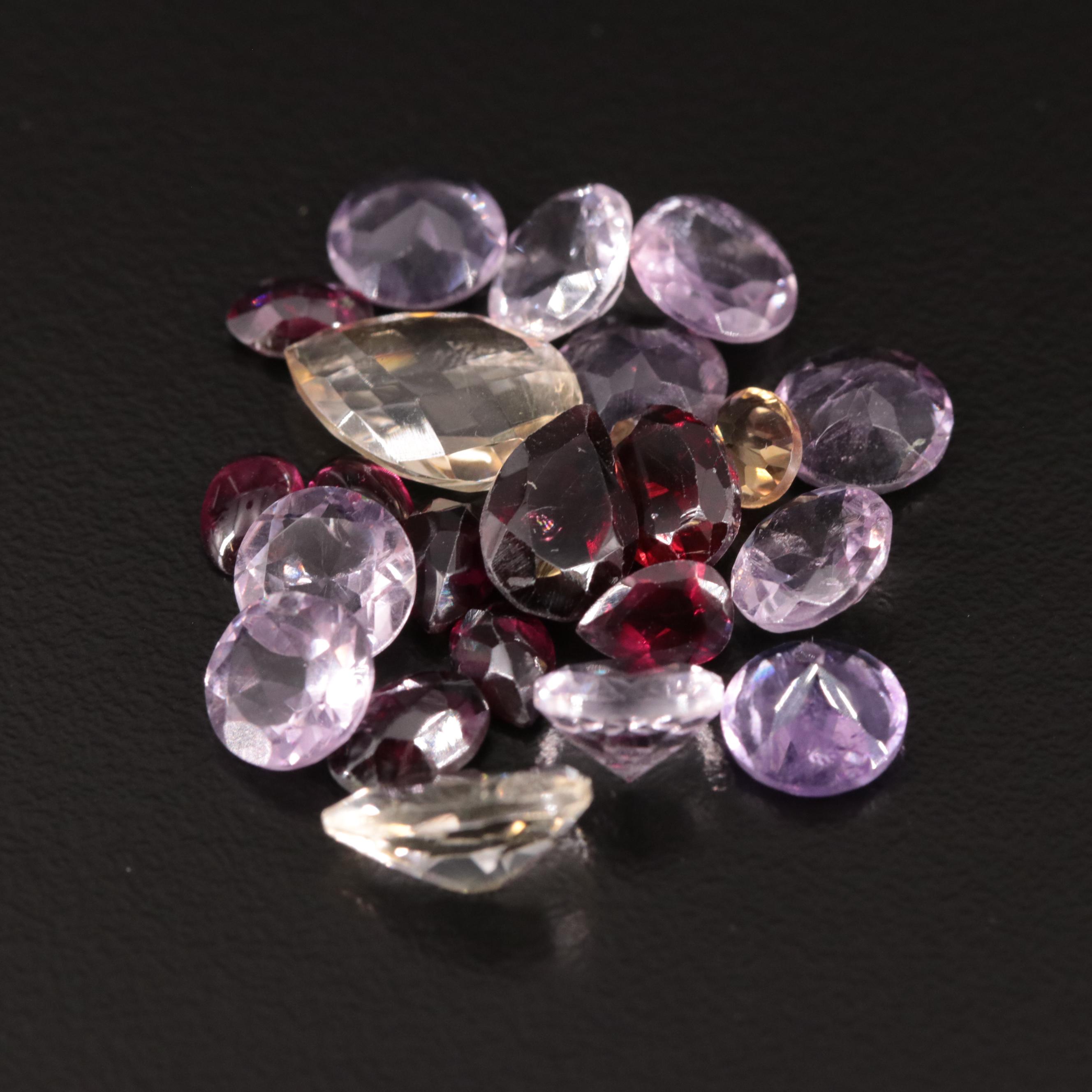 Loose 21.10 CTW Amethyst, Citrine, and Garnet Lot