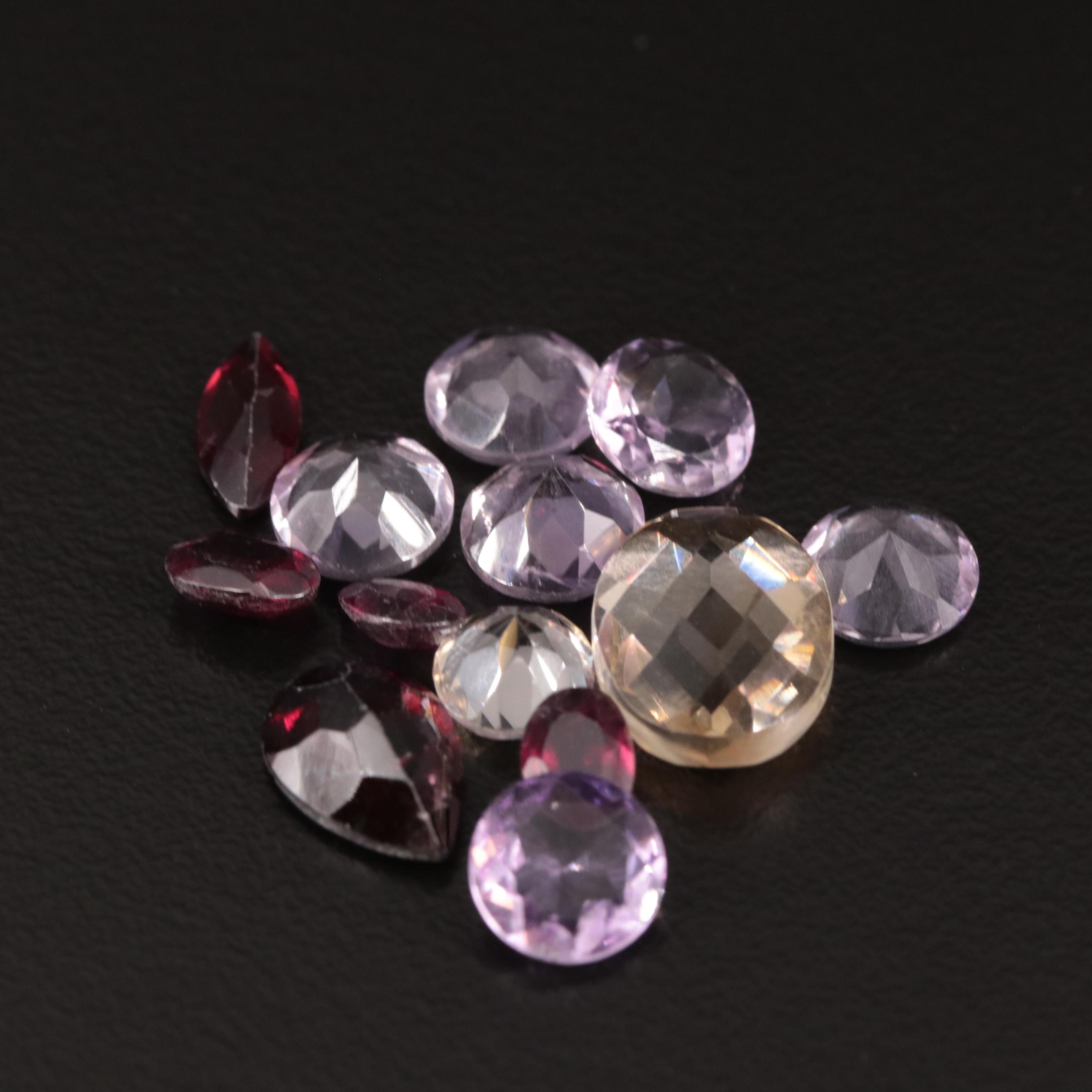 Loose 15.10 Amethyst, Citrine, and Garnet Lot