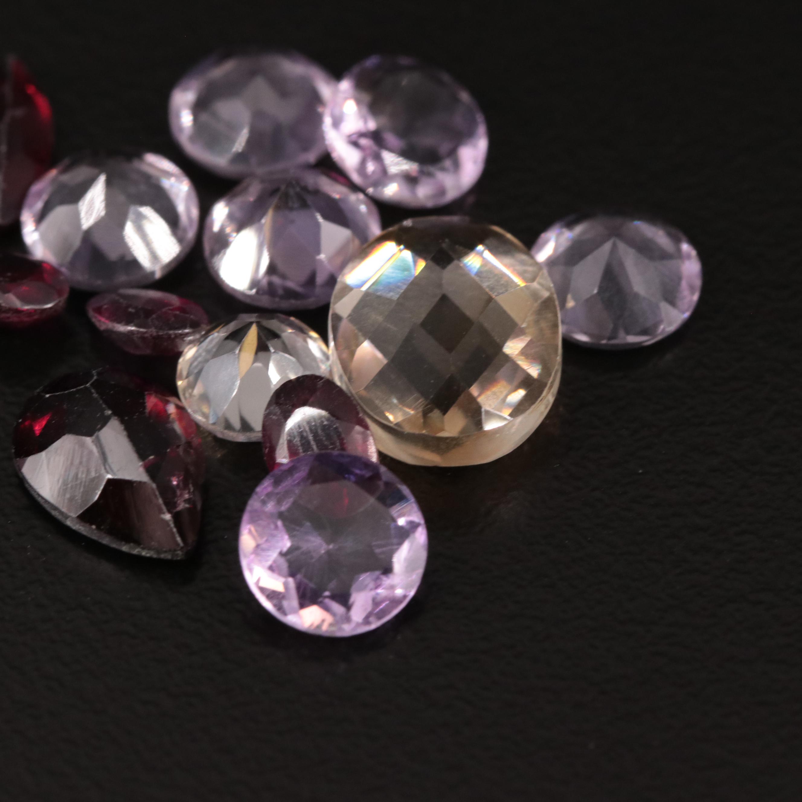 Loose 15.10 Amethyst, Citrine, and Garnet Lot