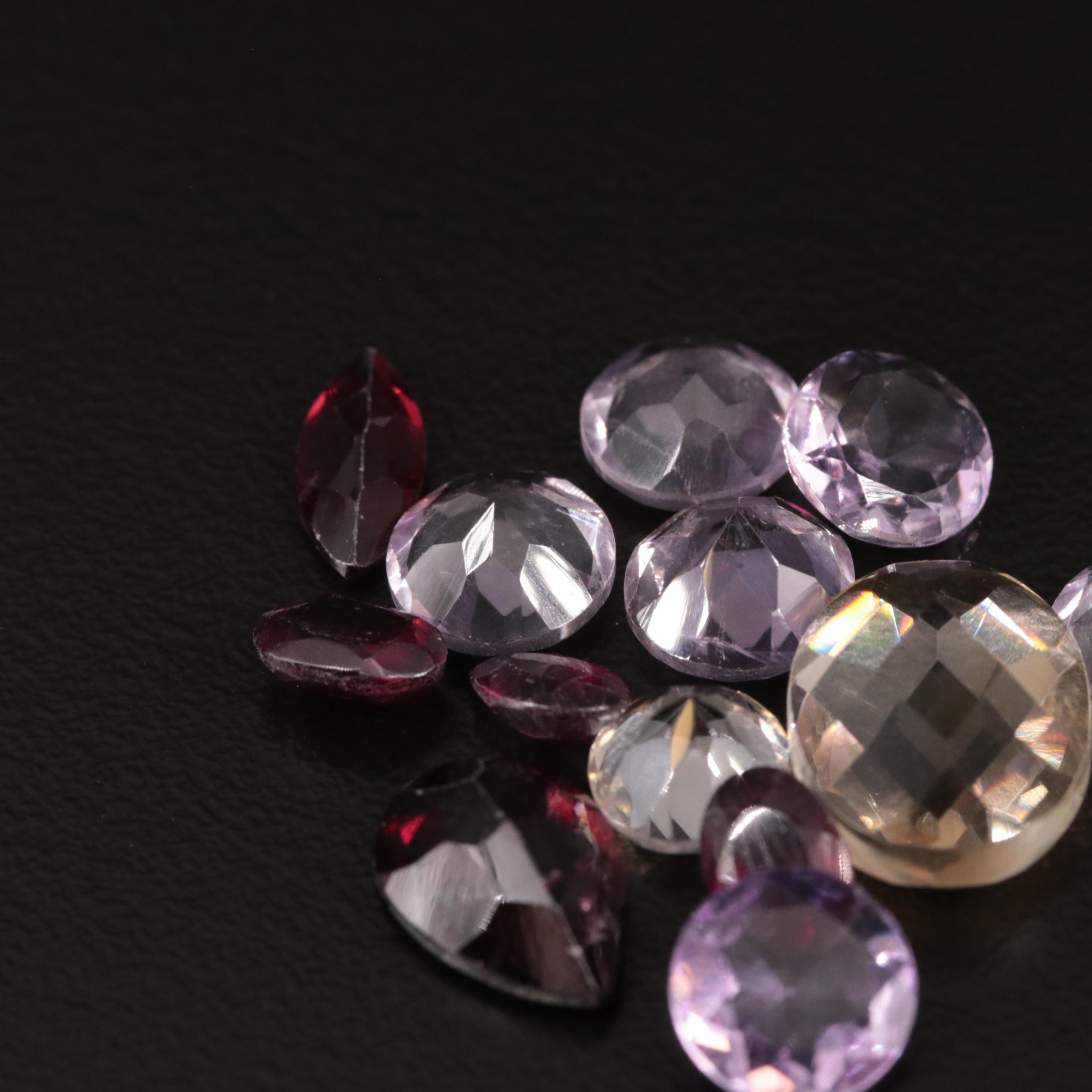 Loose 15.10 Amethyst, Citrine, and Garnet Lot