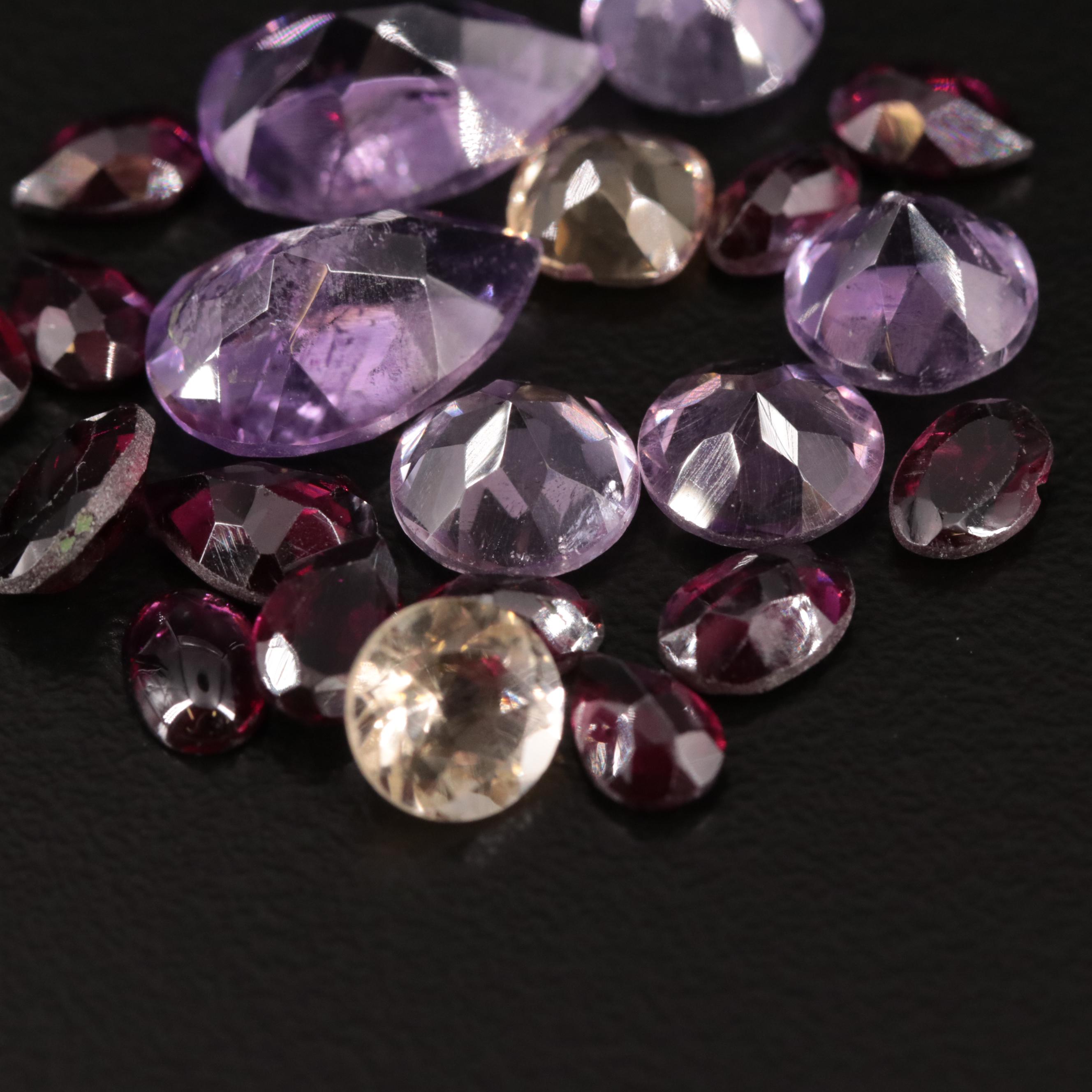 Loose 20.25 CTW Amethyst, Garnet, and Citrine Lot