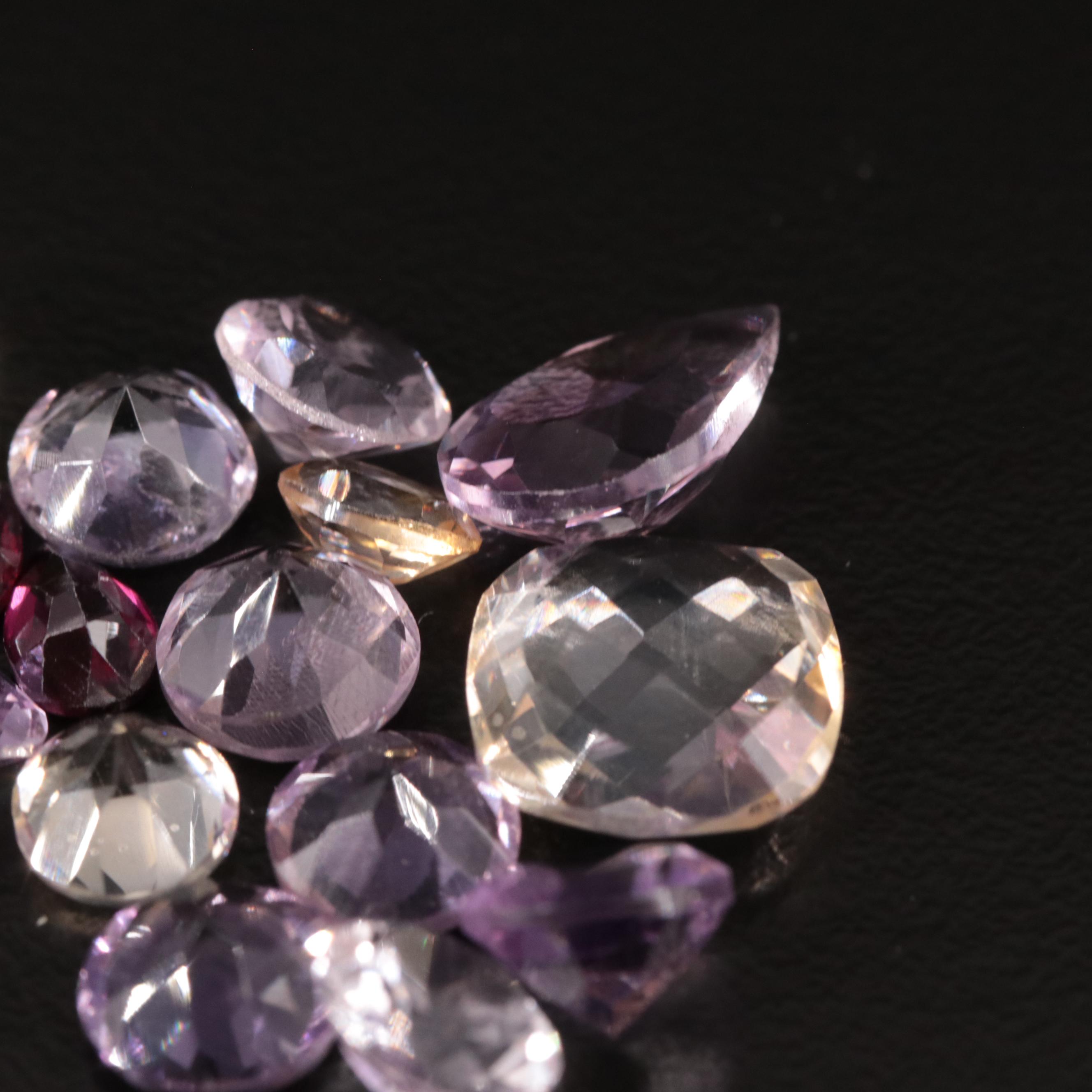 Loose 21.70 CTW Amethyst, Citrine, and Garnet Lot