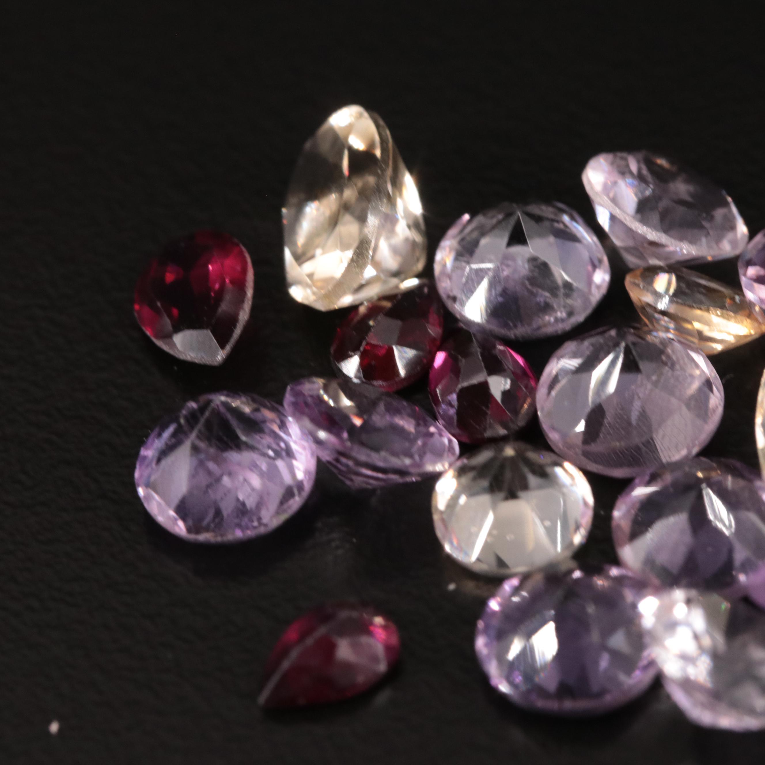 Loose 21.70 CTW Amethyst, Citrine, and Garnet Lot