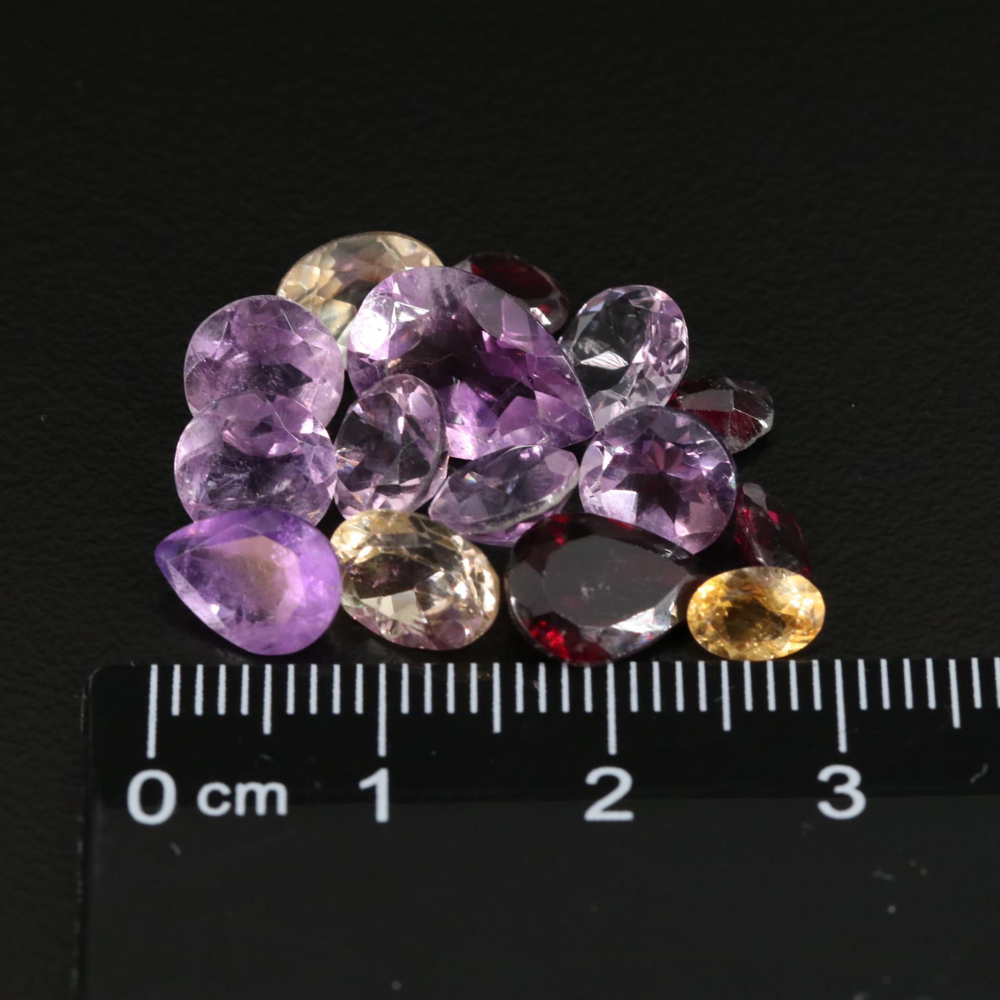 Loose 19.17 CTW Amethyst, Citrine, and Garnet Lot