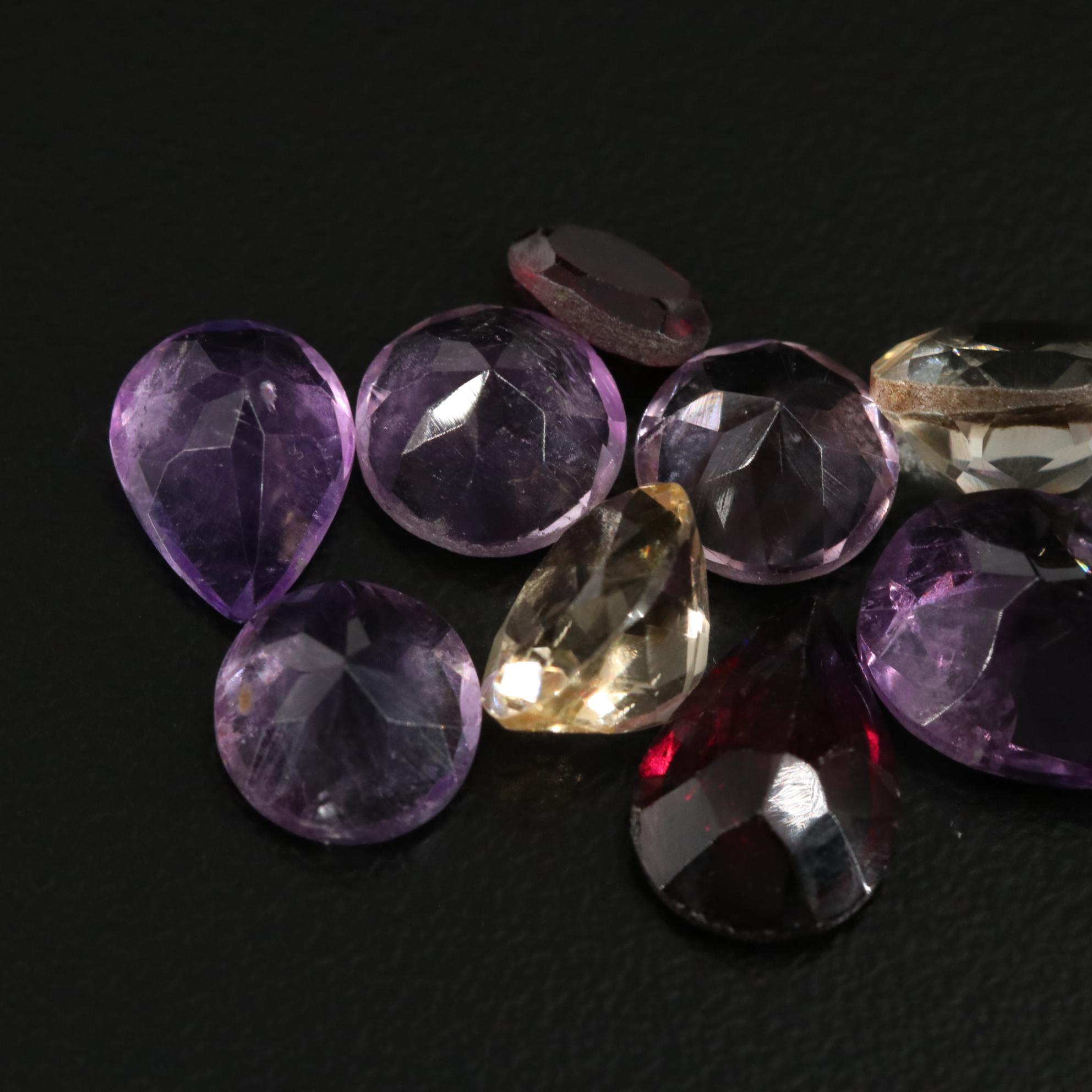 Loose 19.17 CTW Amethyst, Citrine, and Garnet Lot