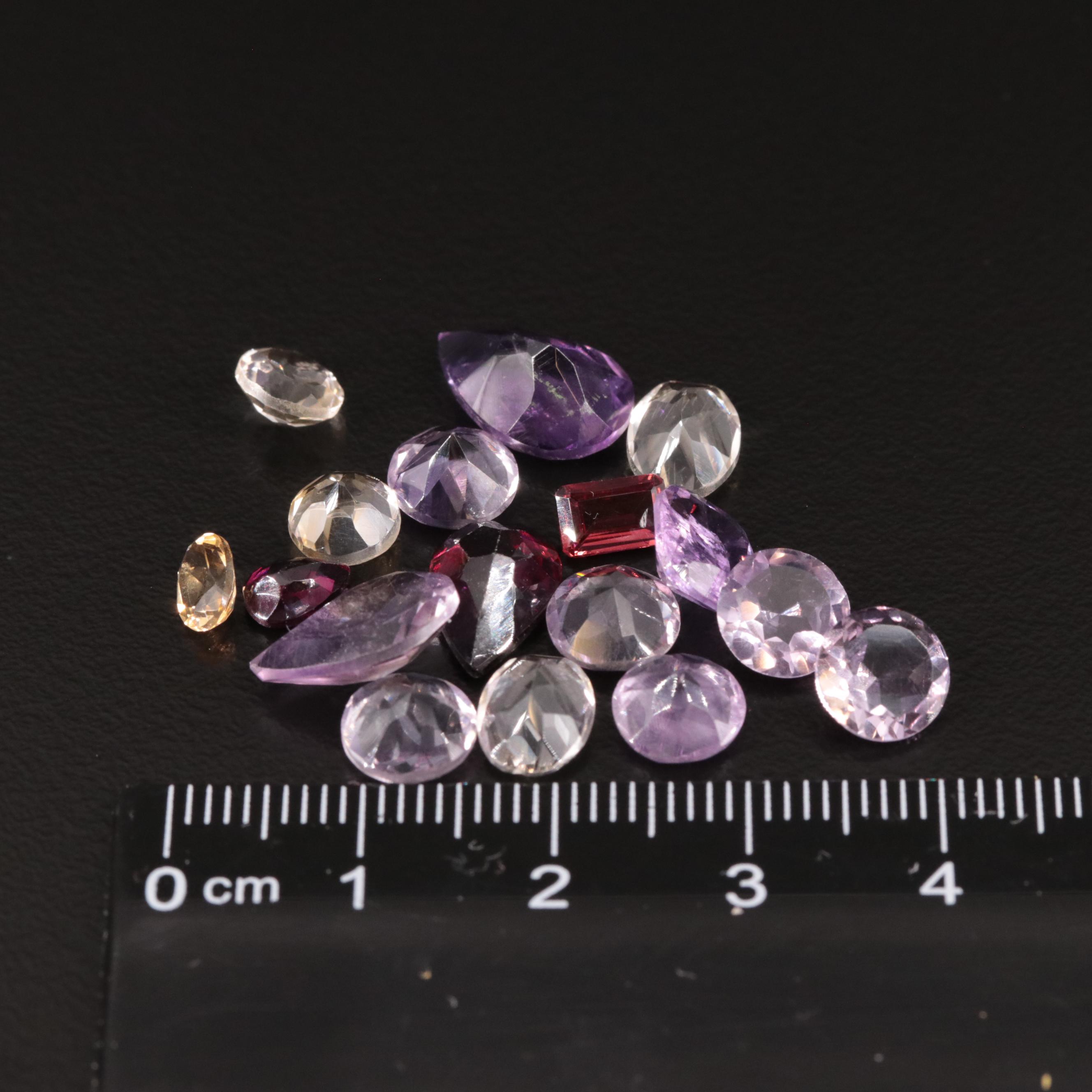 Loose 20.75 CTW Amethyst, Citrine, and Garnet Lot
