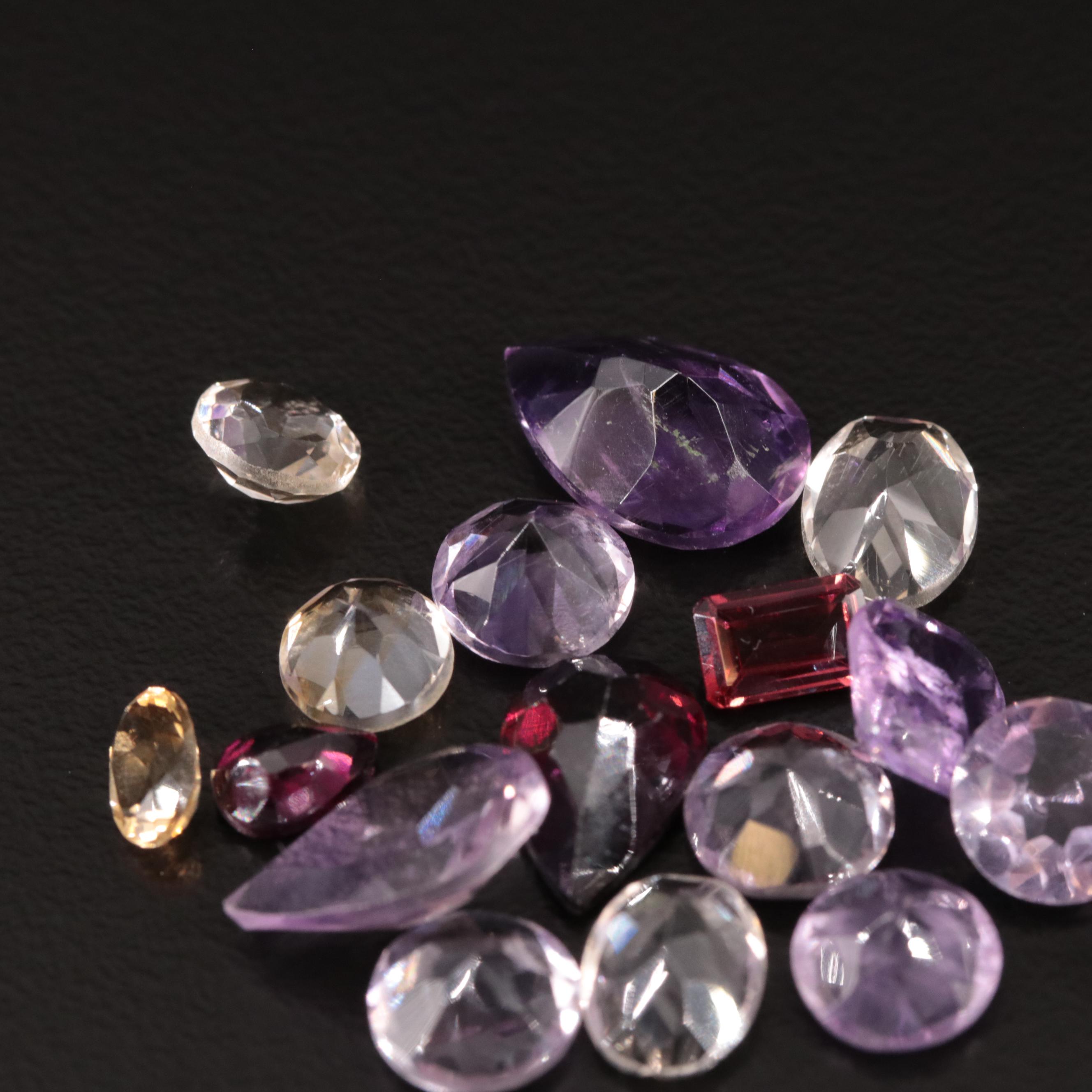 Loose 20.75 CTW Amethyst, Citrine, and Garnet Lot