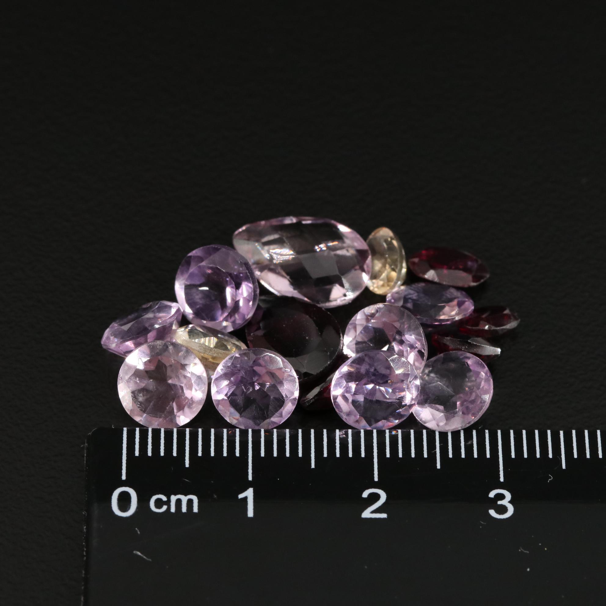 Loose 17.42 CTW Amethyst, Citrine, and Garnet Lot