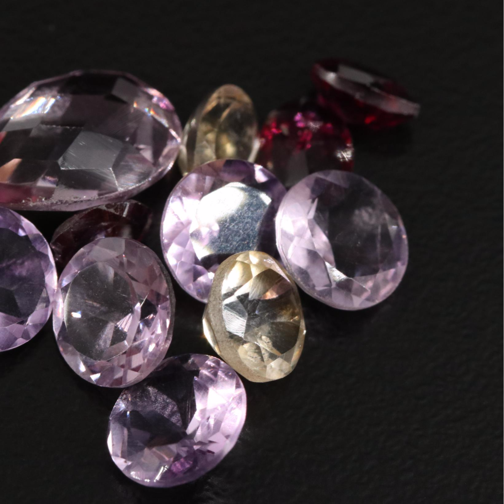 Loose 17.42 CTW Amethyst, Citrine, and Garnet Lot